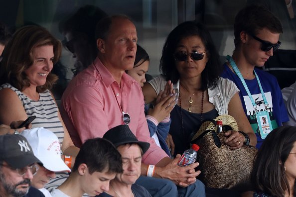  Actor Woody Harrelson and his wife Laura Louie at the 2018 French Open - Day Thirteen on June 8, 2018 | Photo: Getty Images
