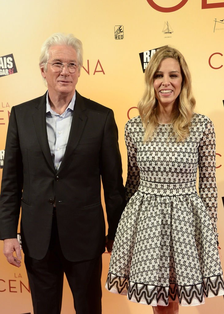 Richard Gere and Alejandra Silva attend the 'La Cena' (The Dinner) premiere at the Capitol cinema on December 11, 2017, in Madrid, Spain. | Source: Getty Images.