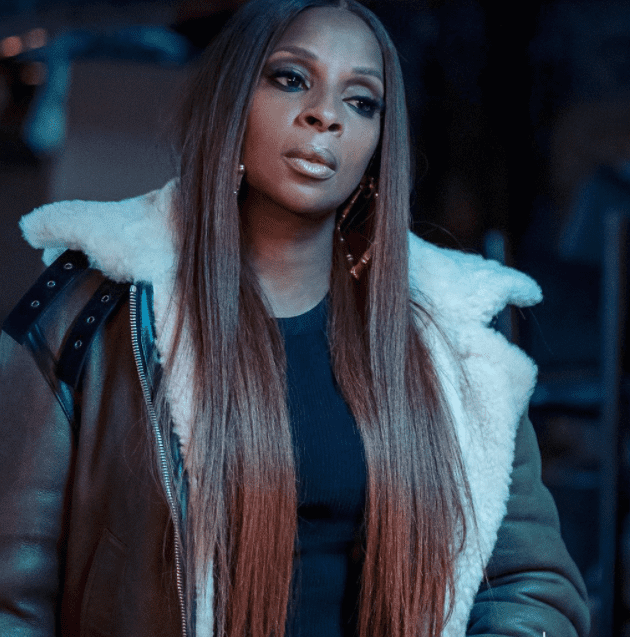 Mary J Blige Dons Fierce Look On Ghost In A 4 000 Shearling Trim Coat Gigantic Earrings