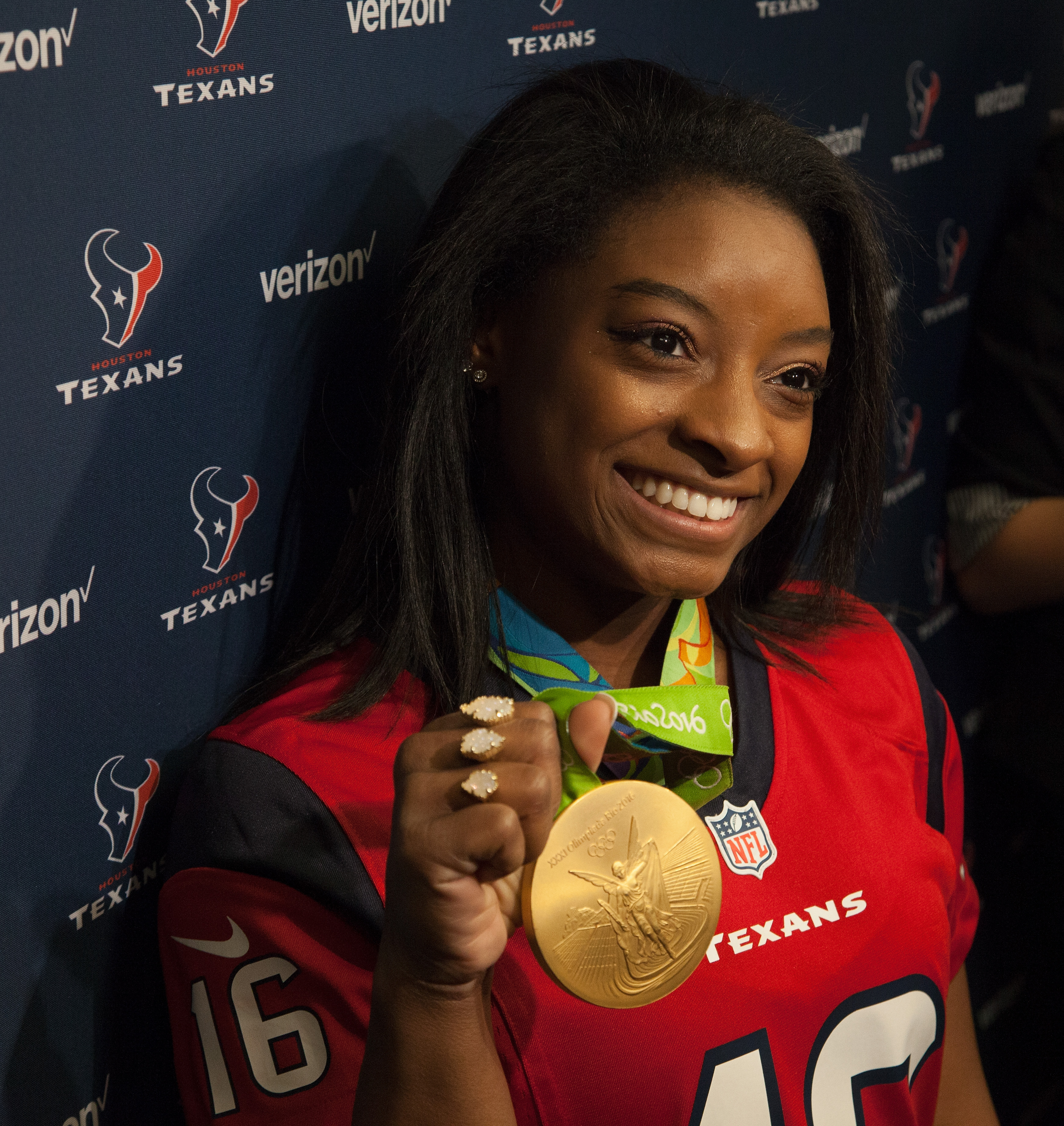 Simone Biles speaks with the media at the Houston Texans at NRG Stadium in Houston, Texas, on December 18, 2016. | Source: Getty Images