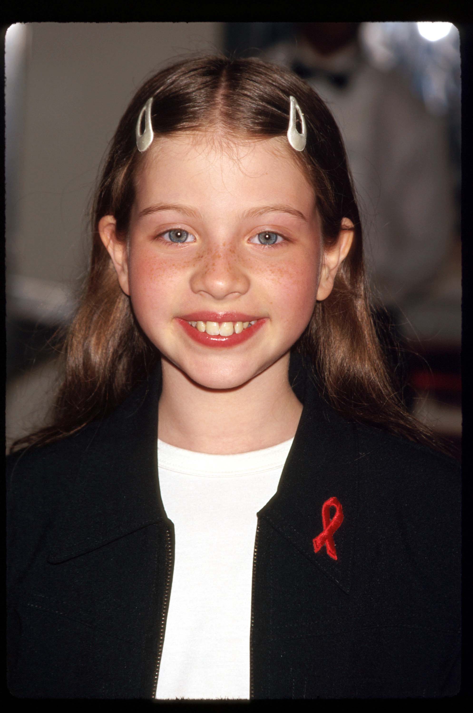 Michelle Trachtenberg at the premiere of "Harriet The Spy," in 1996 | Source: Getty Images