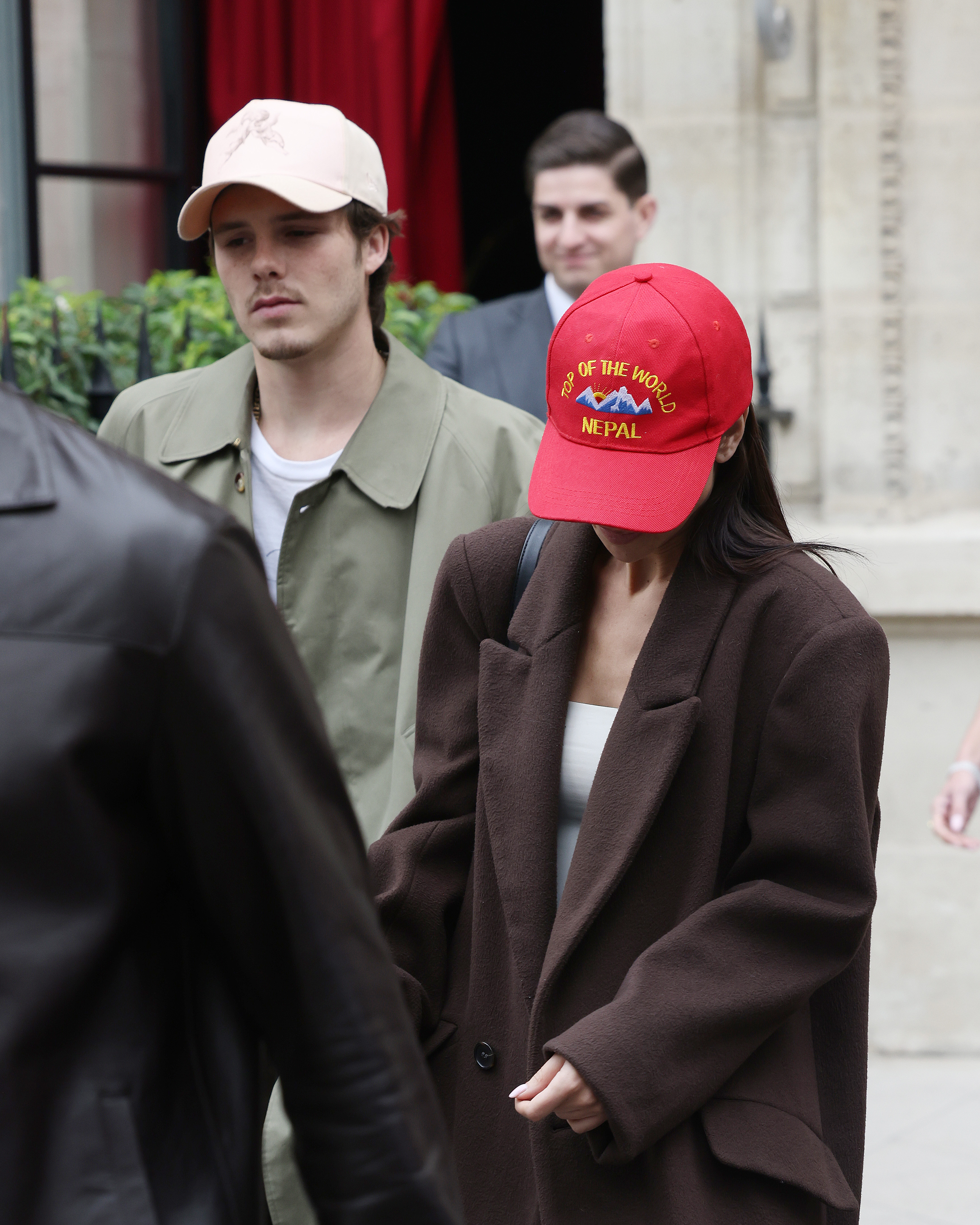 The pair are seen checking out of their Paris hotel on 29 September 2024 — keeping things low-key as Fashion Week crowds swirl around them during Womenswear Spring/Summer 2025.