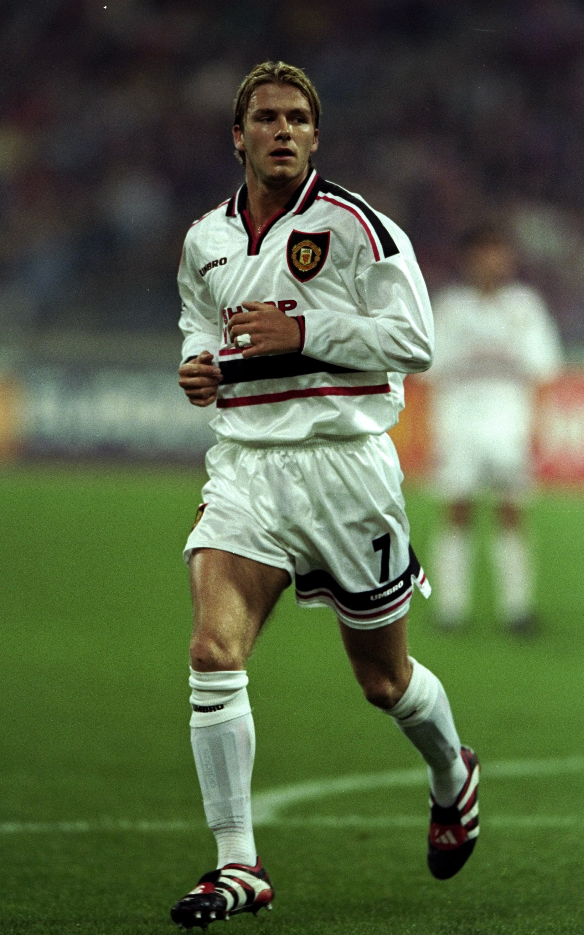 David Beckham in action during the Champions League match against Bayern Munich at the Olympic Stadium on 30 September 1998 in Munich, Germany. | Source: Getty Images
