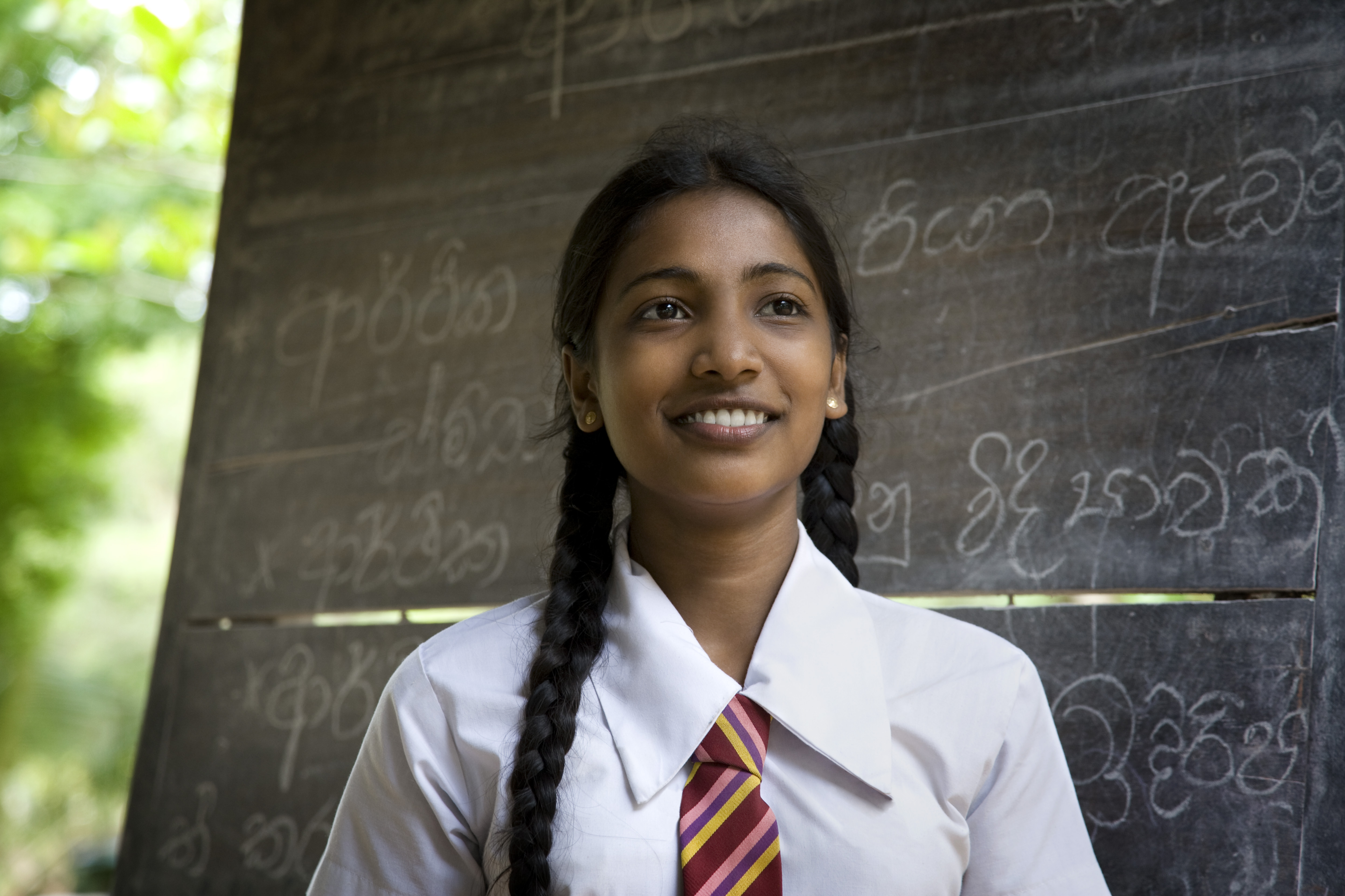A South-Asian student with long hair | Source: Getty Images