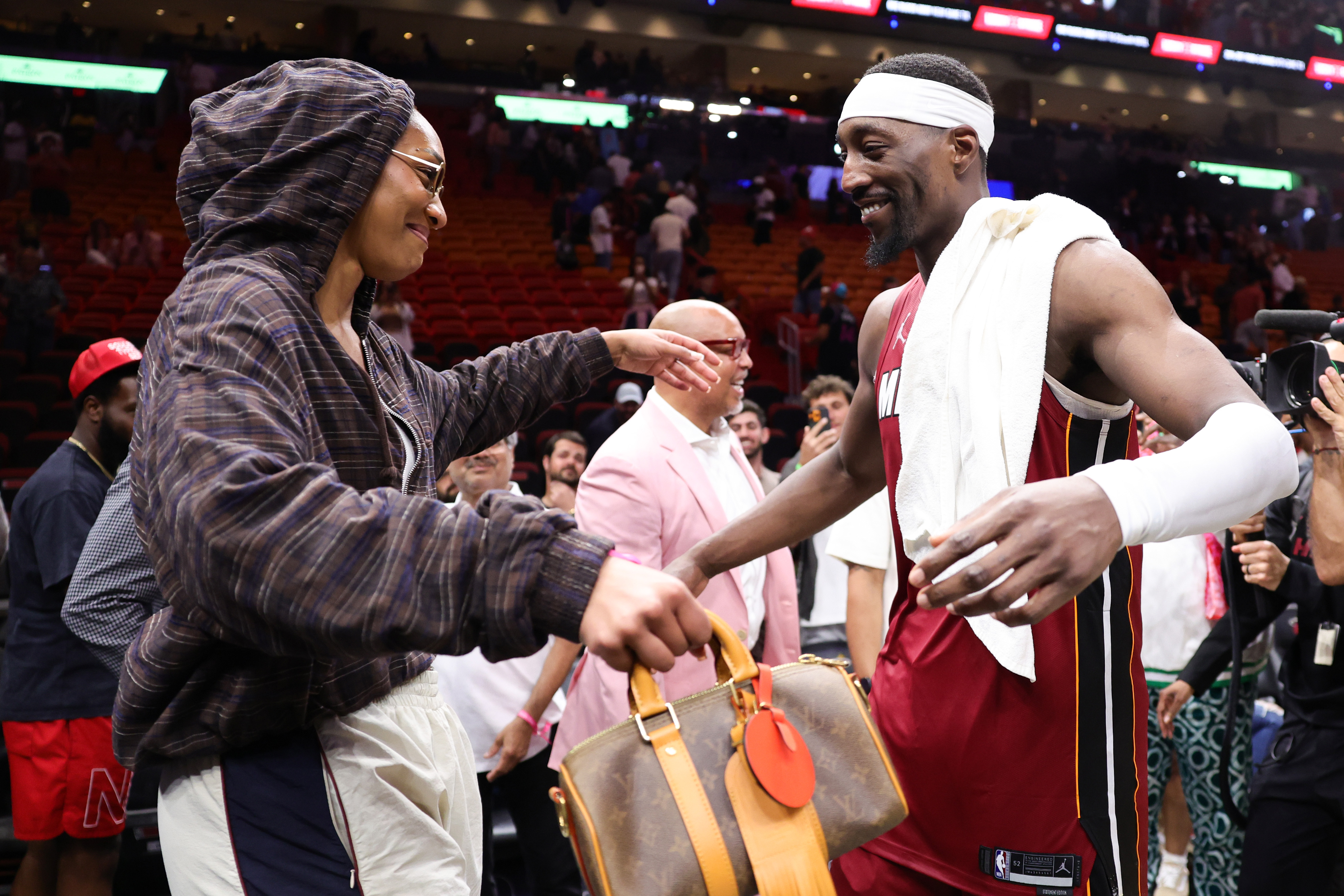 A'ja Wilson and Bam Adebayo embrace after a win over the Washington Wizards at Kaseya Center on March 10, 2026, in Miami, Florida | Source: Getty Images