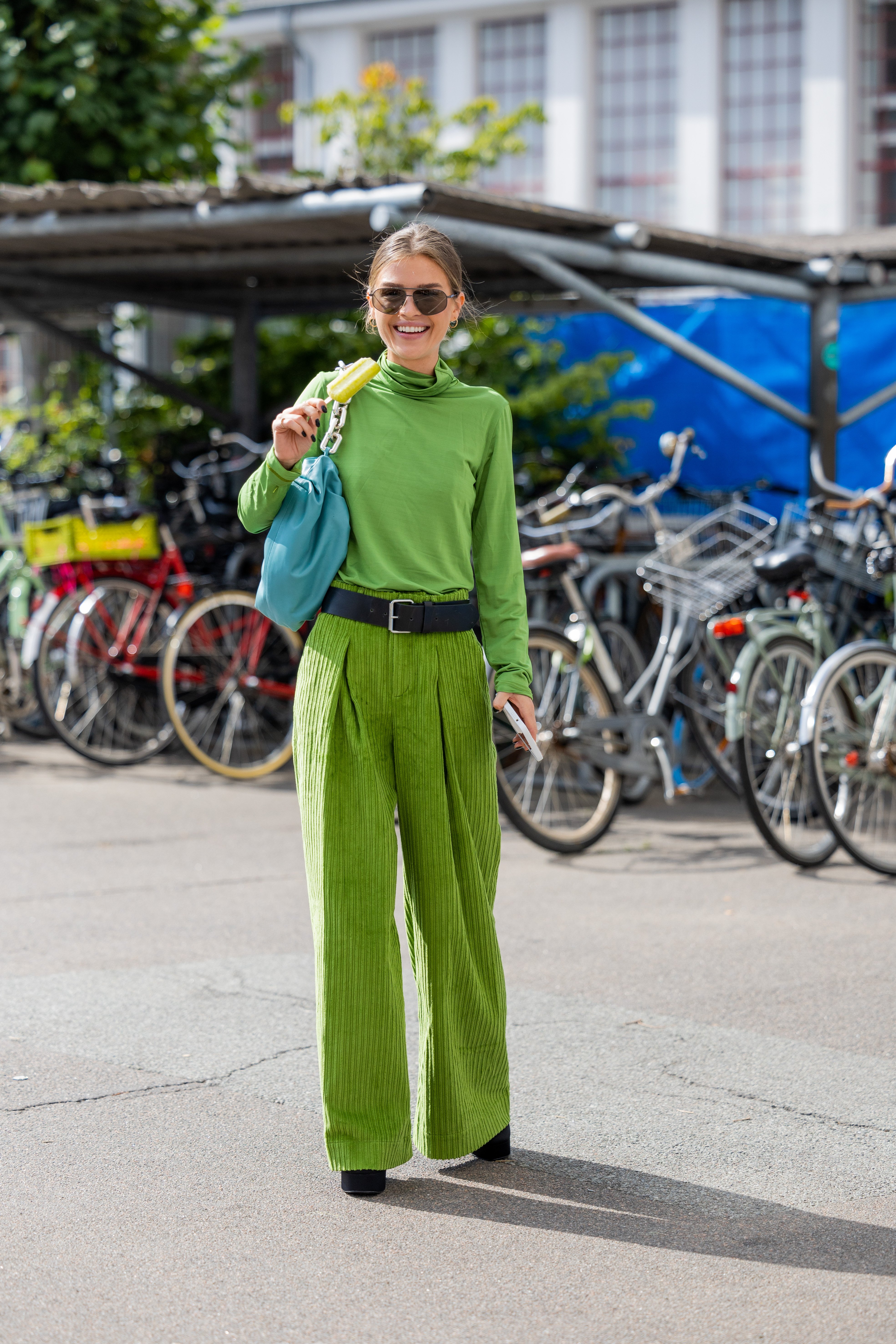 Gine Margrethe wearing green corduroy pants during Copenhagen Fashion Week Spring/Summer 2023 on August 09, 2022, in Copenhagen, Denmark. | Source: Getty Images