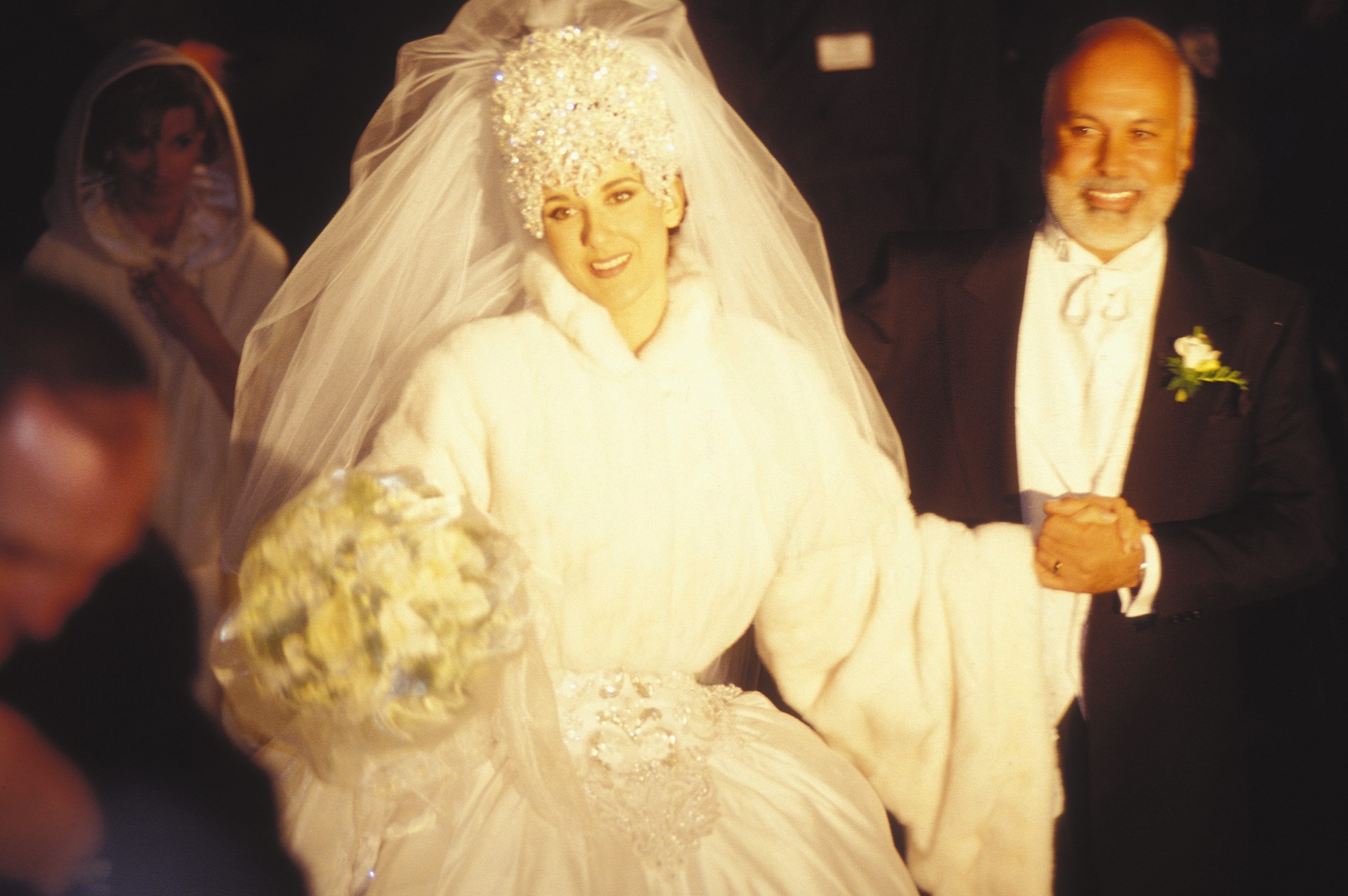 Celine Dion with husband Rene Angelil on their wedding day on December 15, 1994 in Montreal, Canada. / Source: Getty Images