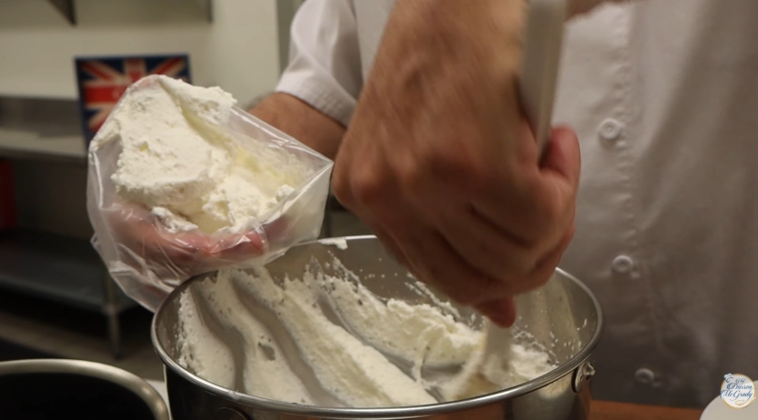 Darren McGrady whipped cream to stiff peaks before folding it into Greek yoghurt for the royal dessert in a video dated 6 April 2026. | Source: YouTube/Darren McGrady