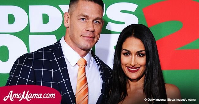 John Cena and Nikki Bella share a very passionate kiss in public. The couple look so in love