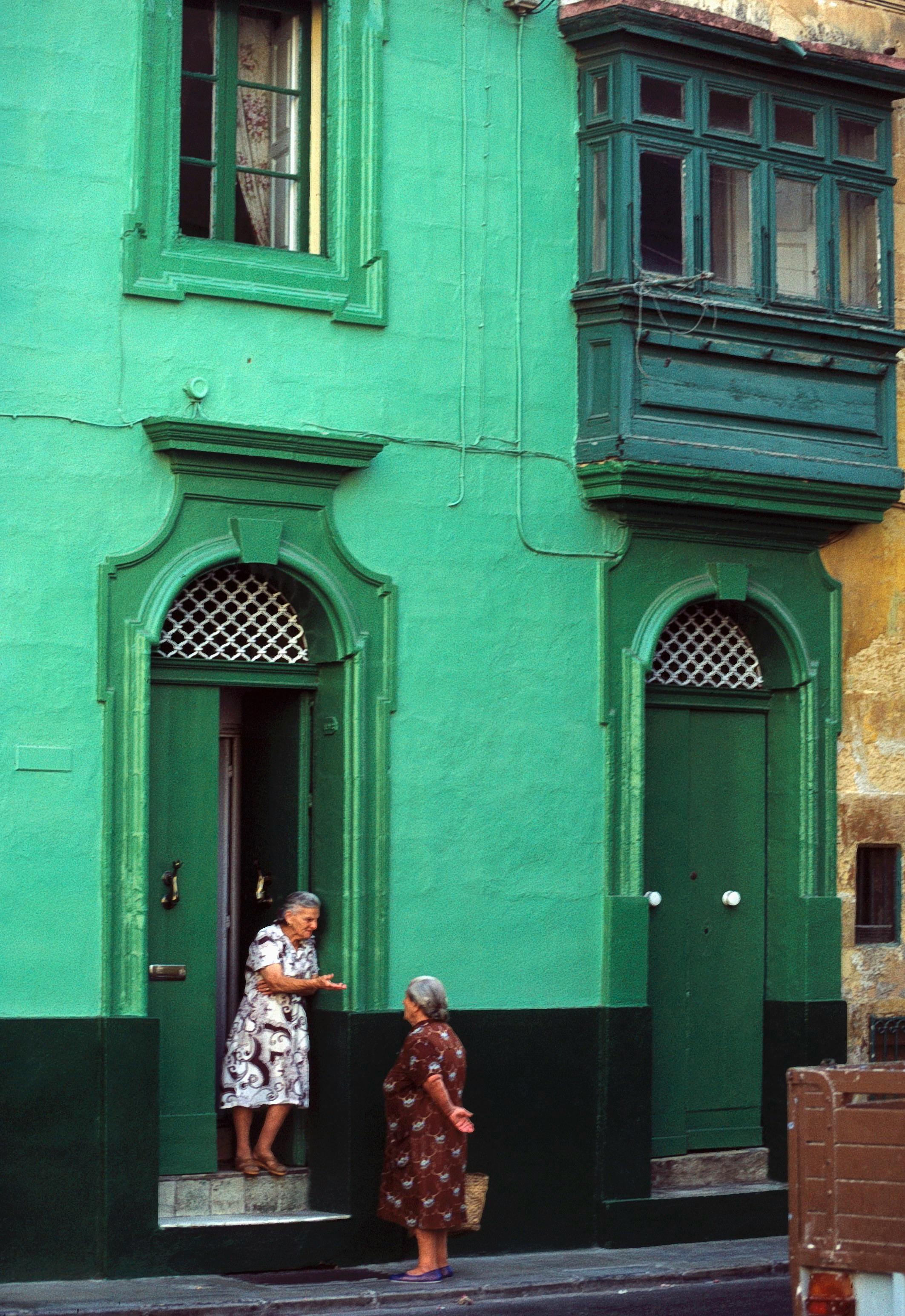 Elderly women talking near the door | Source: Pexels