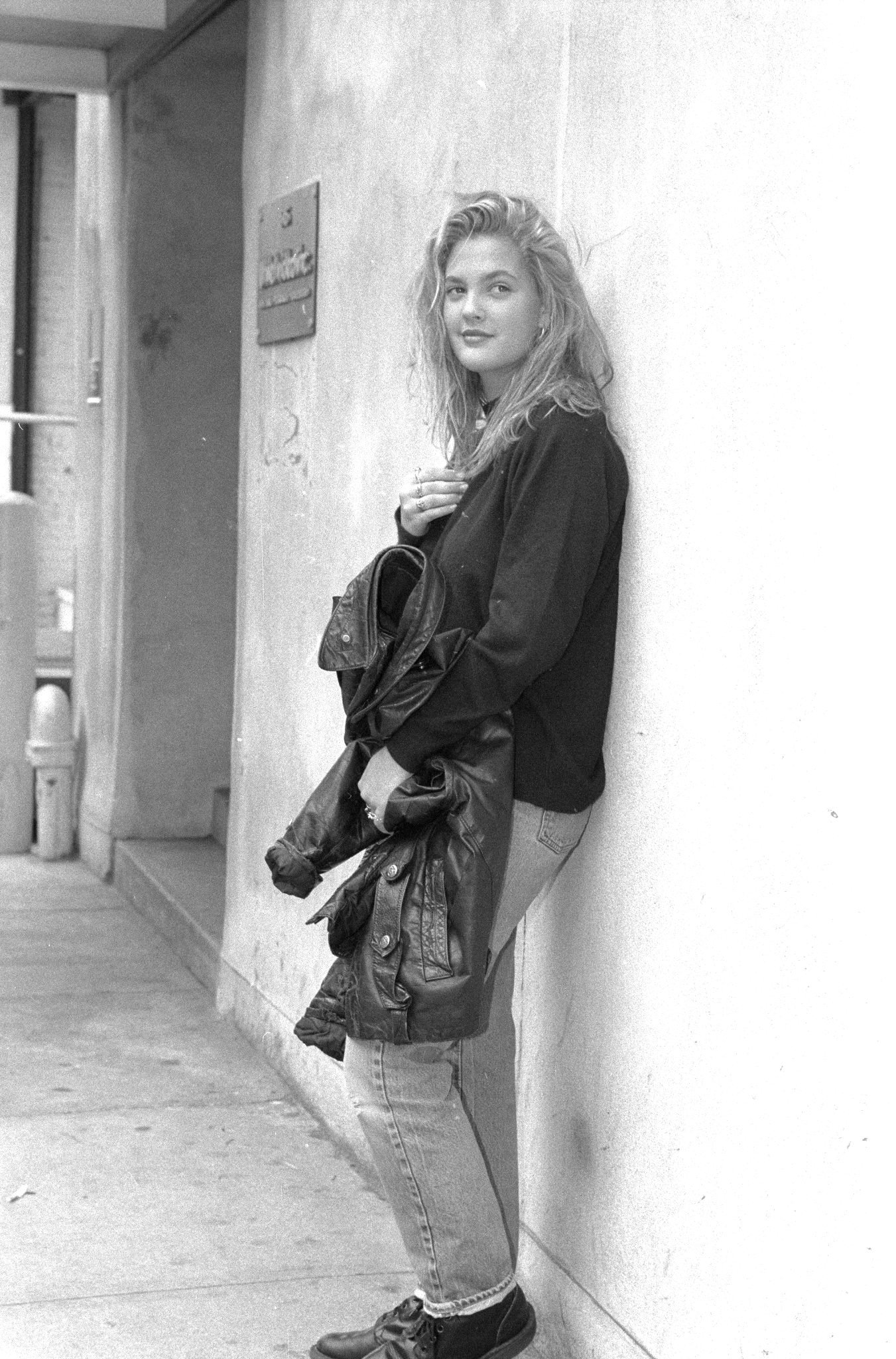 Drew Barrymore on the street outside Sally Jessy Raphael's show, where she plugged her book, "Little Girl Lost." | Photo: Getty Images