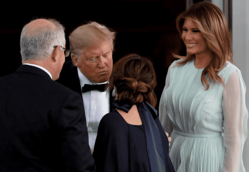 Melania Trump looks on while President Donald Trump greets wife of Australian Prime Minister, Jenny Morrison. Prime Minister Morrison had arrived with his wife arrive for a state dinner at the White House, on September 20, 2019 in Washington, DC.  | Source: Getty Images