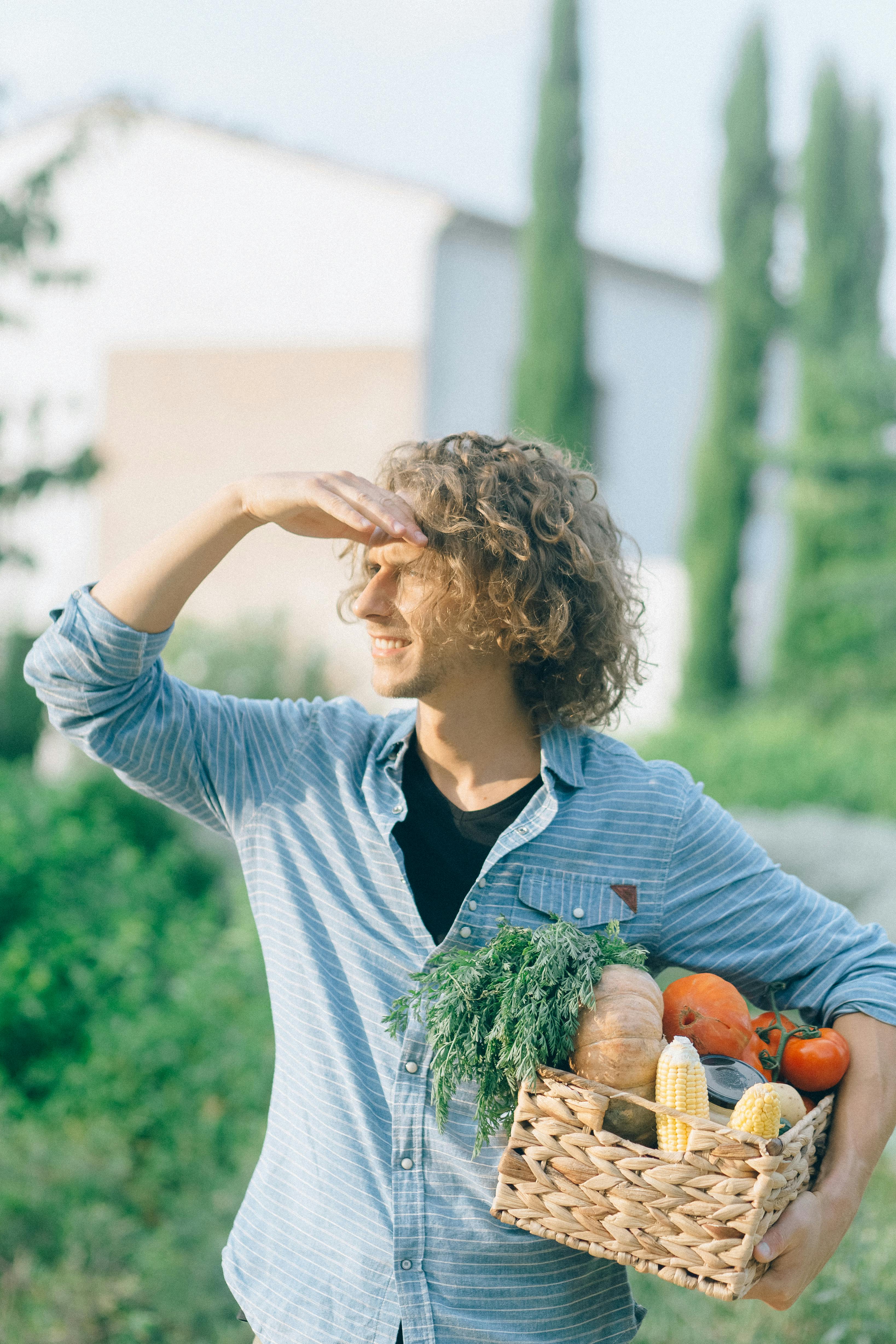 Gardener with his harvest | Source: Pexels