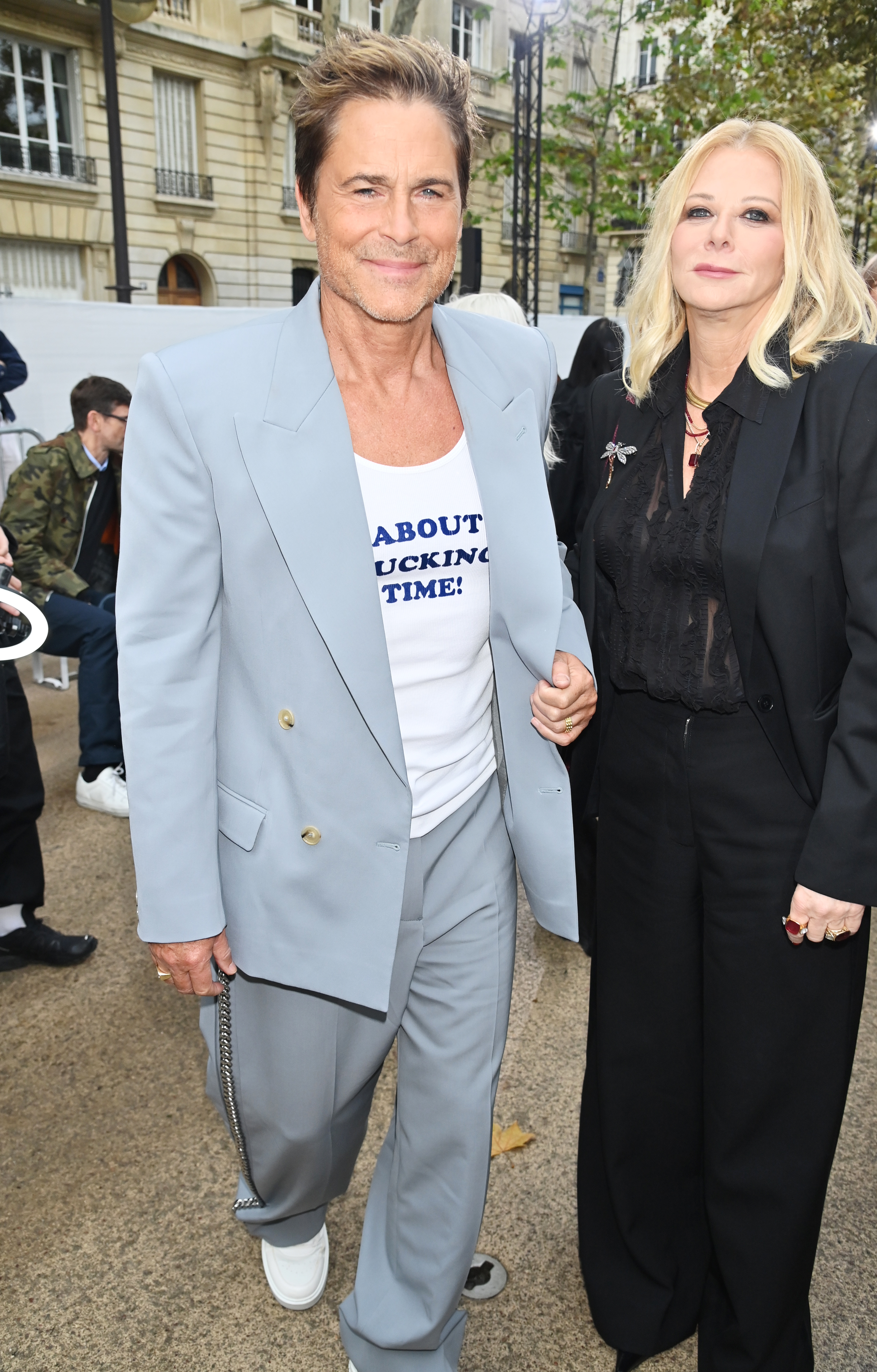 Rob Lowe and Sheryl Berkoff attend the Stella McCartney show during Paris Fashion Week Womenswear Spring/Summer 2025 on September 30, 2024 | Source: Getty Images