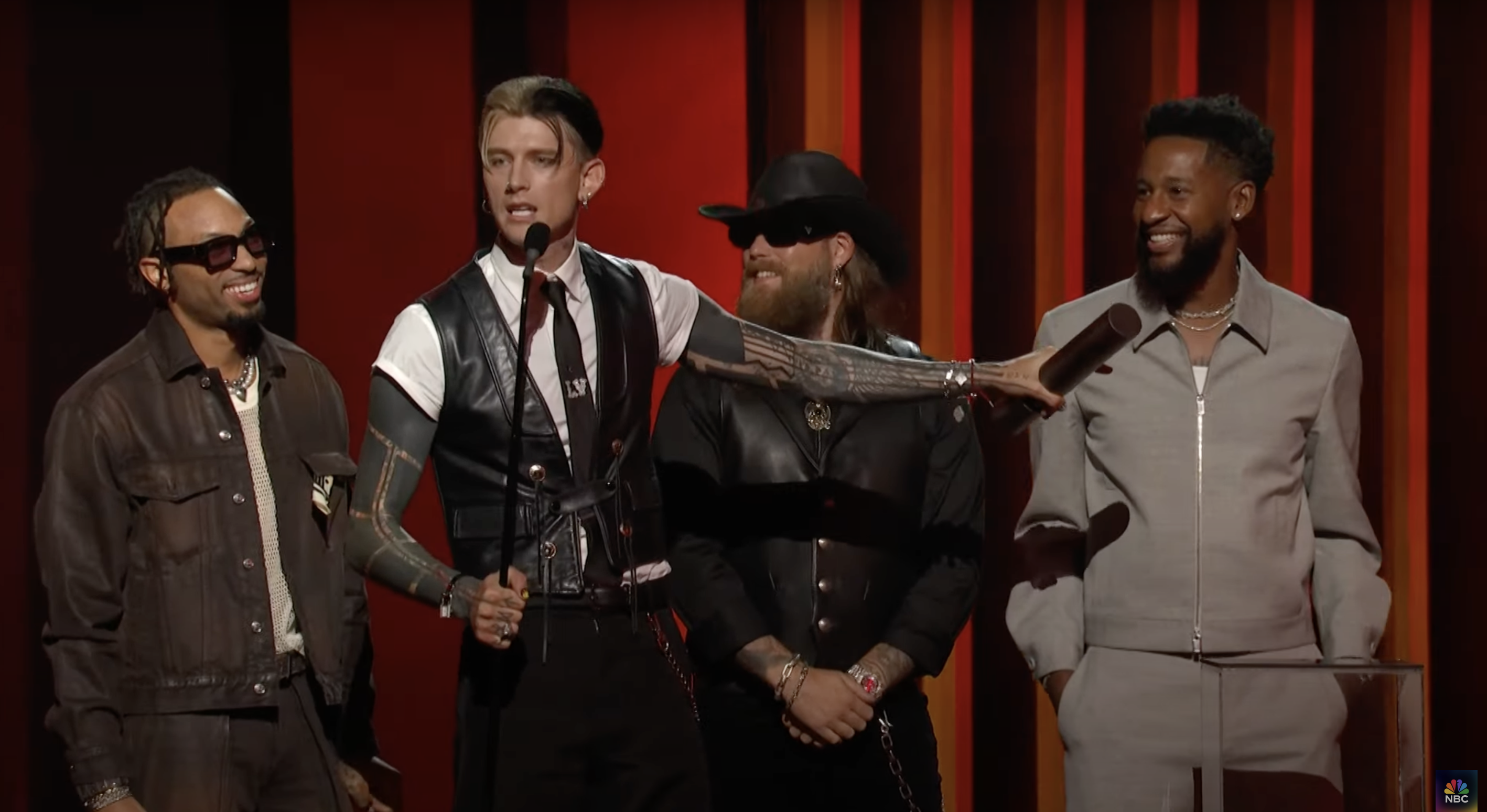 Machine Gun Kelly accepts his award onstage during the 2024 People's Choice Country Awards | Source: YouTube/NBC