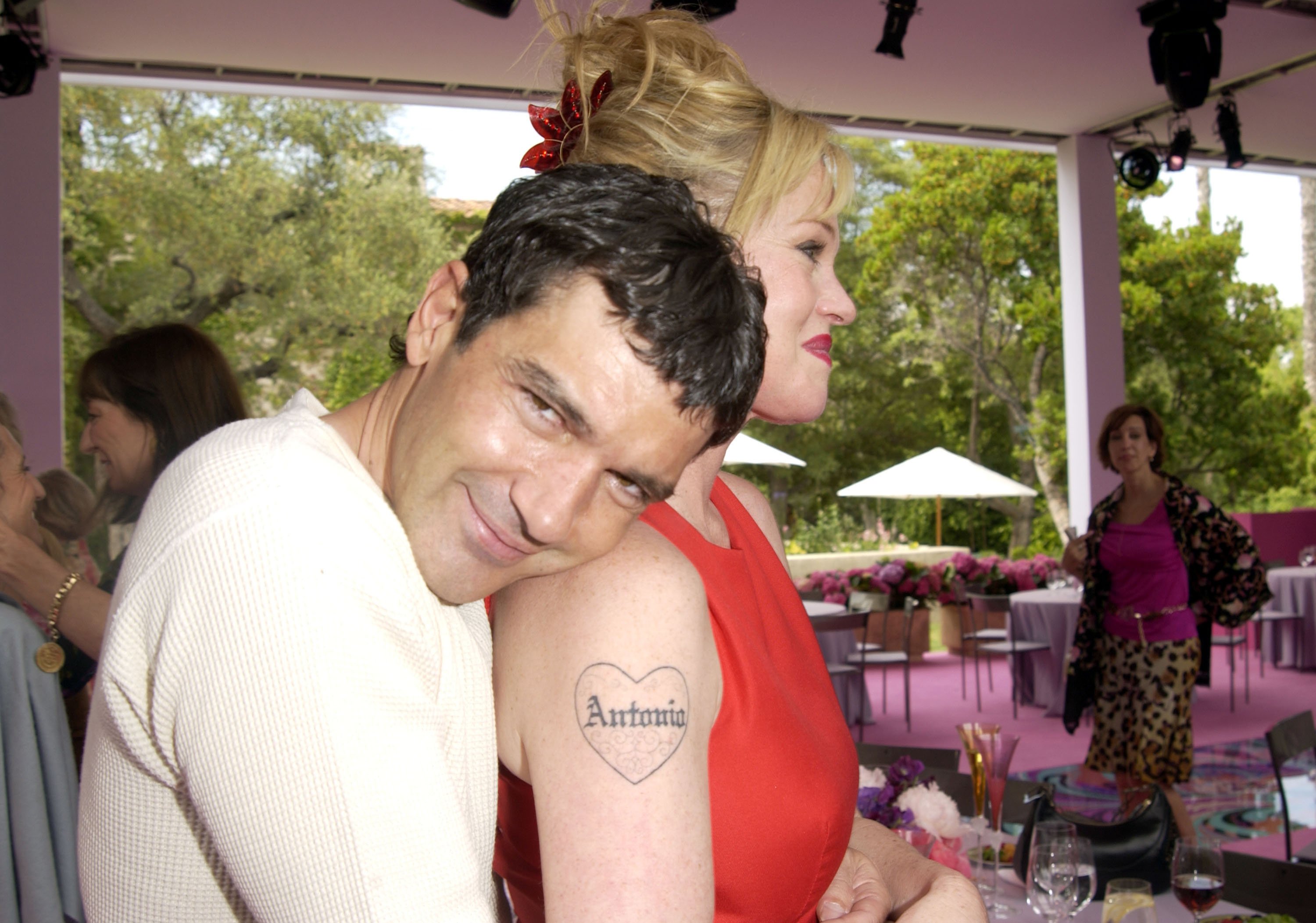Antonio Banderas and Melanie Griffith during Versace Luncheon to Benefit Children's Action Network-Westside Children's Center Sponsored By "InStyle" Magazine on May 30, 2002 at Private Home in Los Angeles, California | Source: Getty Images