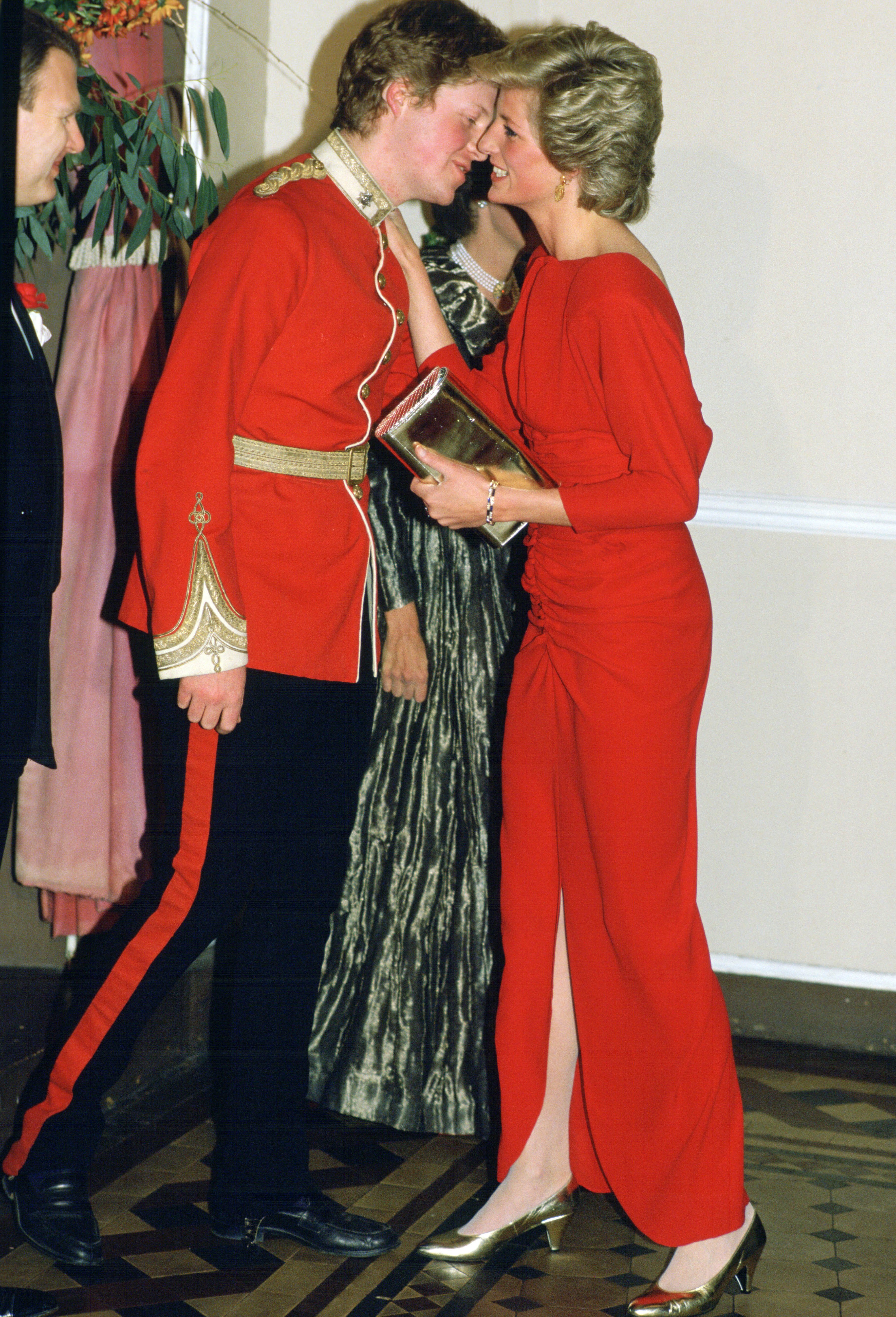 Diana, Princess of Wales photographed kissing her brother, Earl Charles Spencer at the Birthright Ball. / Source: Getty Images