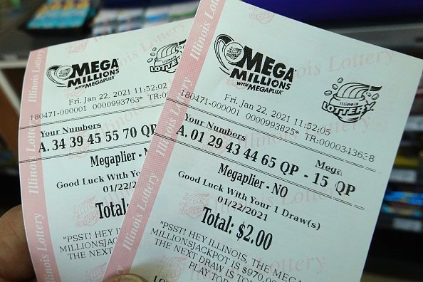 Mega Millions lottery tickets are sold at a 7-Eleven store. | Photo: Getty Images