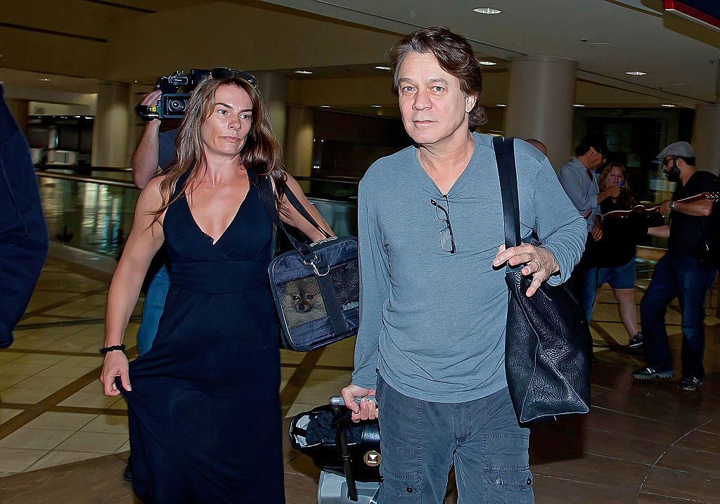 Eddie Van Halen and Janie Liszewski are seen at Los Angeles International Airport on June 27, 2012 in Los Angeles, California. | Source: Getty Images