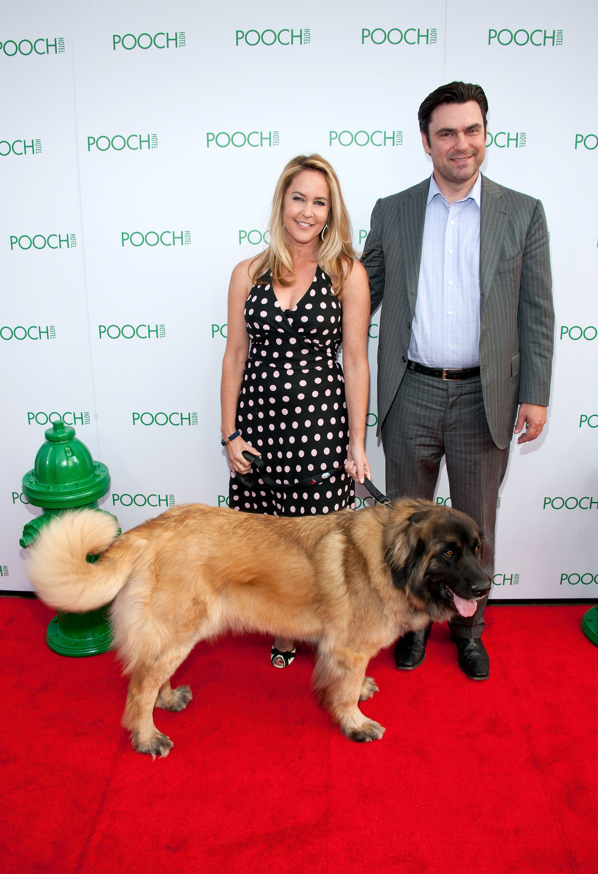 Erin Murphy, her husband Darren Dunckel and their dog Zuma at the Pooch Hotel Hollywood Grand Opening on May 3, 2012, in Hollywood, California. | Source: Getty Images