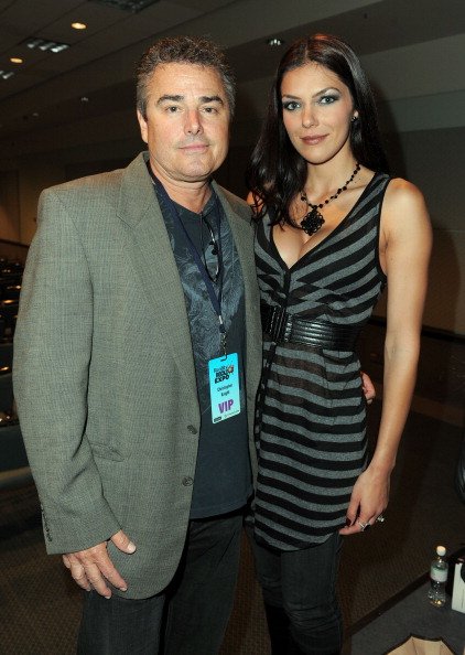 The actor pictured with Adrianne Curry at the Los Angeles Convention Center on April 9, 2011 in Los Angeles, California | Source: Getty Images