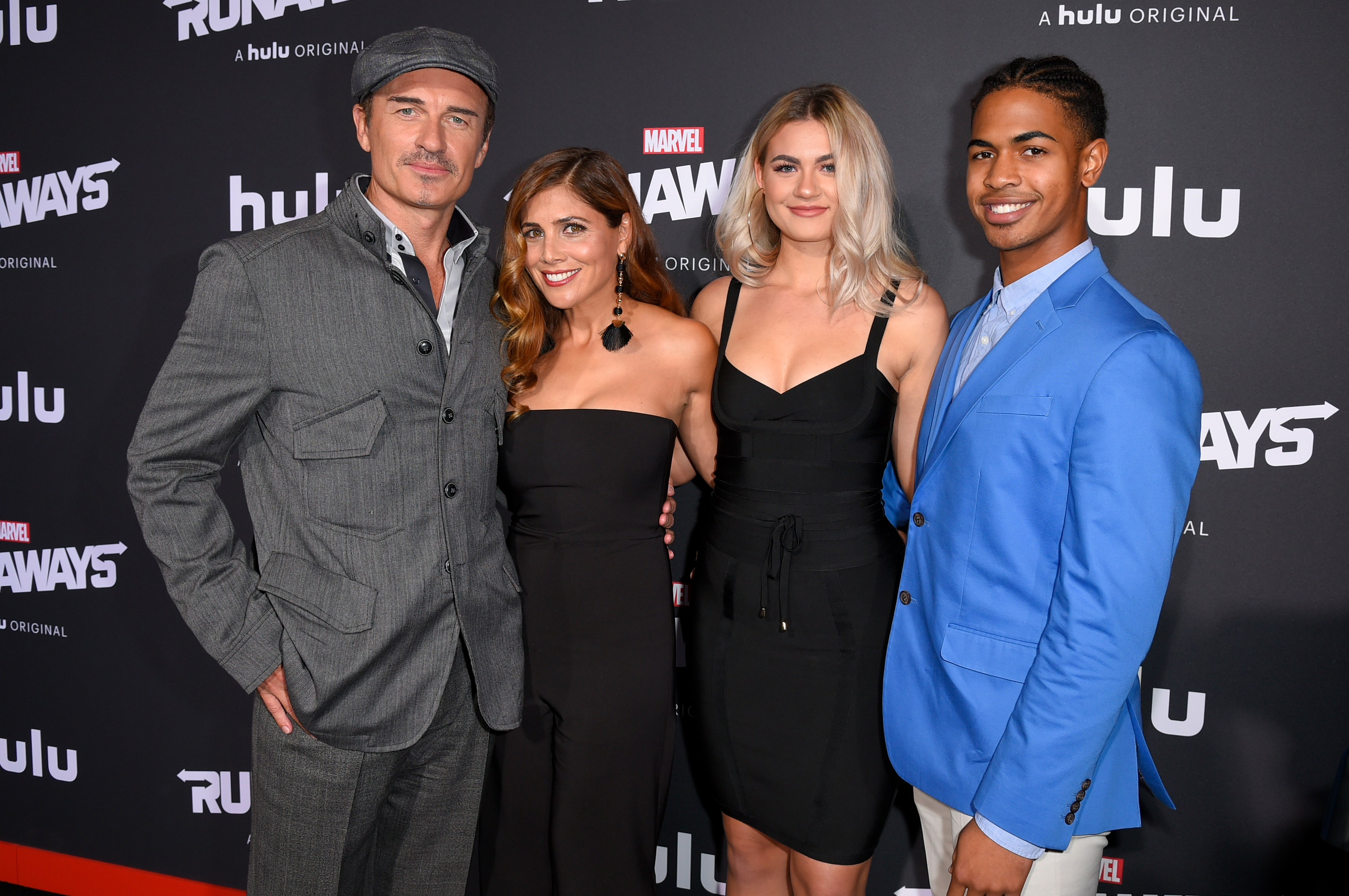 Julian McMahon, Kelly Paniagua, and guests during the "Runaways" film premiere on November 16, 2017, in Los Angeles, California | Source: Getty Images