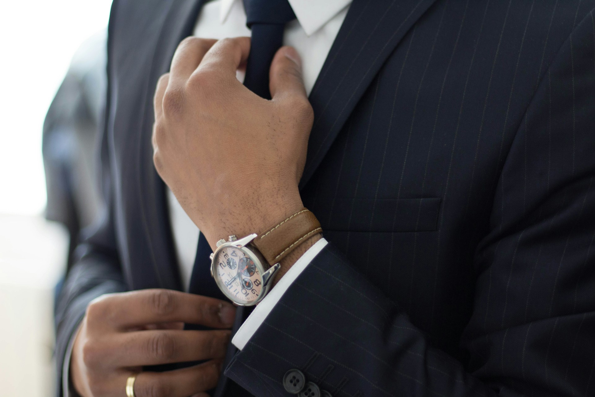 A man dressed in a formal suit | Source: Unsplash