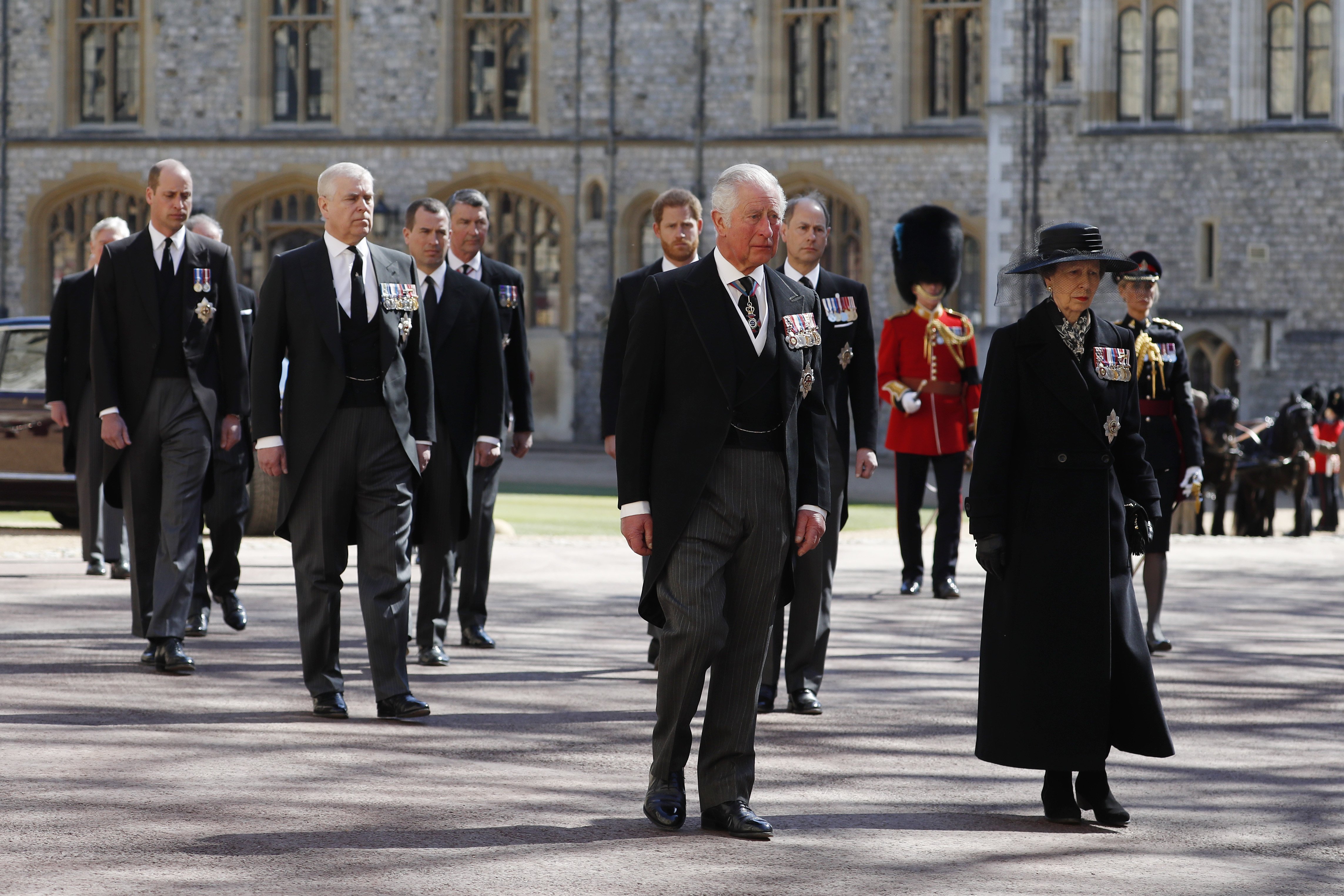 Princess Anne, Prince Charles, Prince Andrew, Prince Edward, Prince William, Peter Phillips, Prince Harry, Earl of Snowdon David Armstrong-Jones and Vice-Admiral Sir Timothy Laurence during the Ceremonial Procession during the funeral of Prince Philip, Duke of Edinburgh at Windsor Castle on April 17, 2021 in Windsor, England. / Source: Getty Images