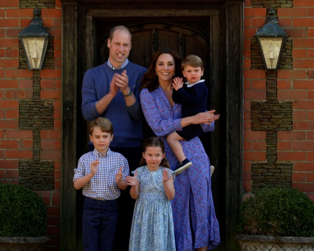 Prince William, Kate Middleton, Prince George, Princess Charlotte and Prince Louis pictured clapping for NHS workers, 2020, London, England. | Photo: Getty Images