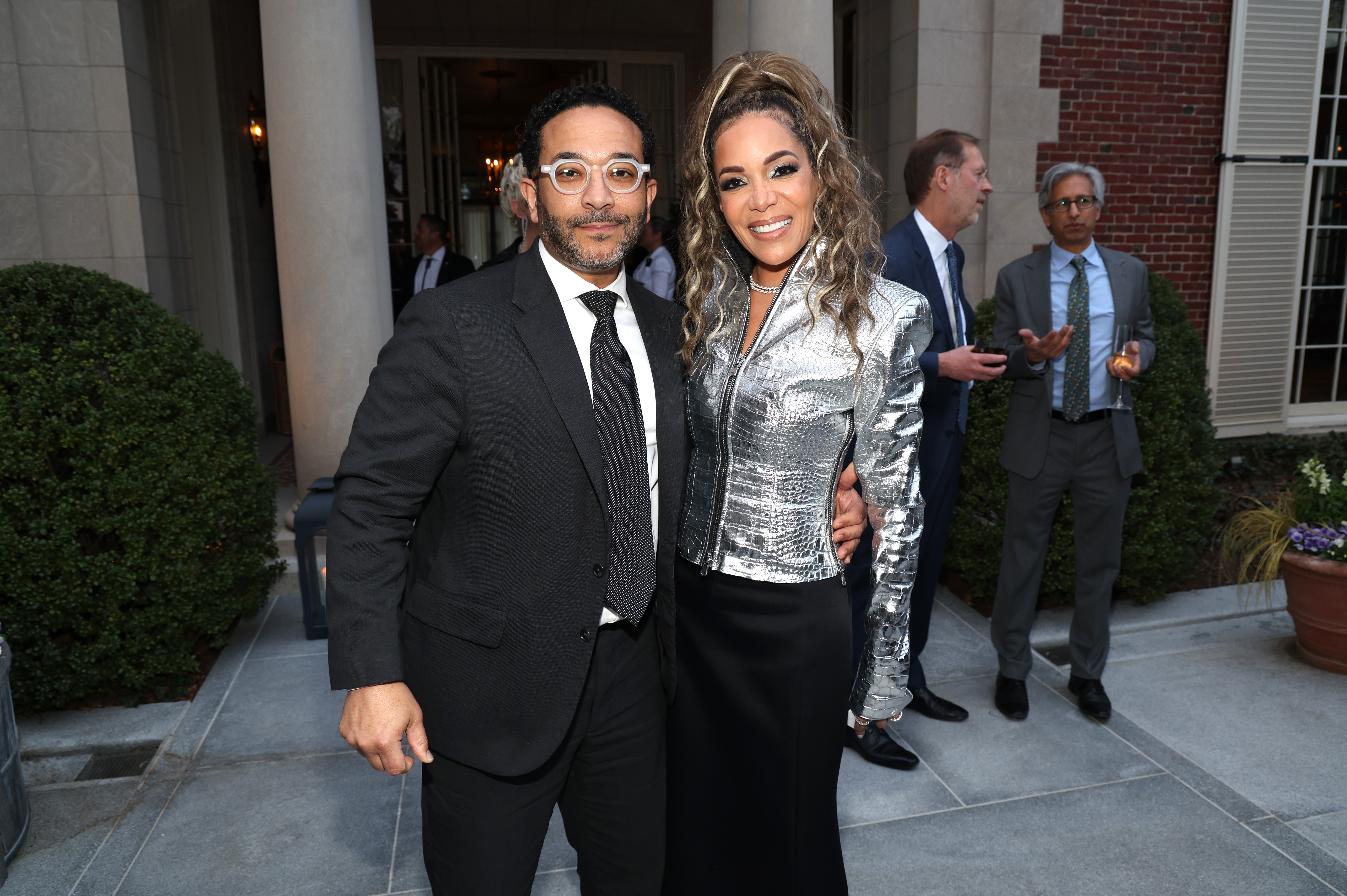 Sunny and Emmanuel “Manny” Hostin in Washington, D.C. on March 14, 2024 | Source: Getty Images