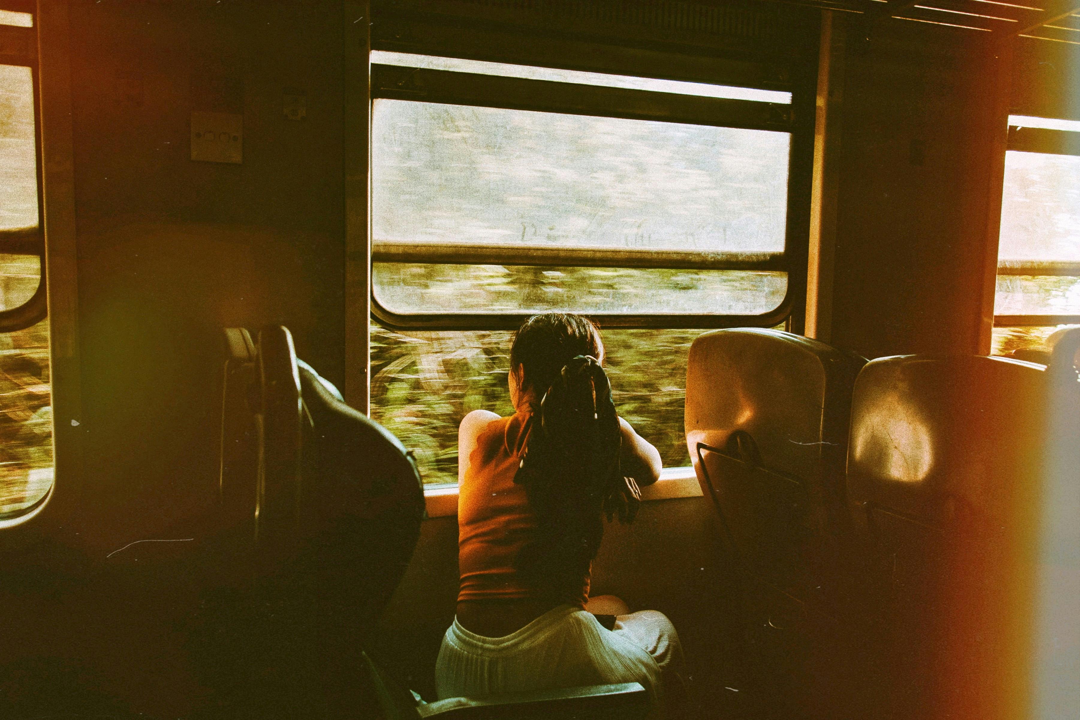 A woman is travelling by train | Source: Pexels