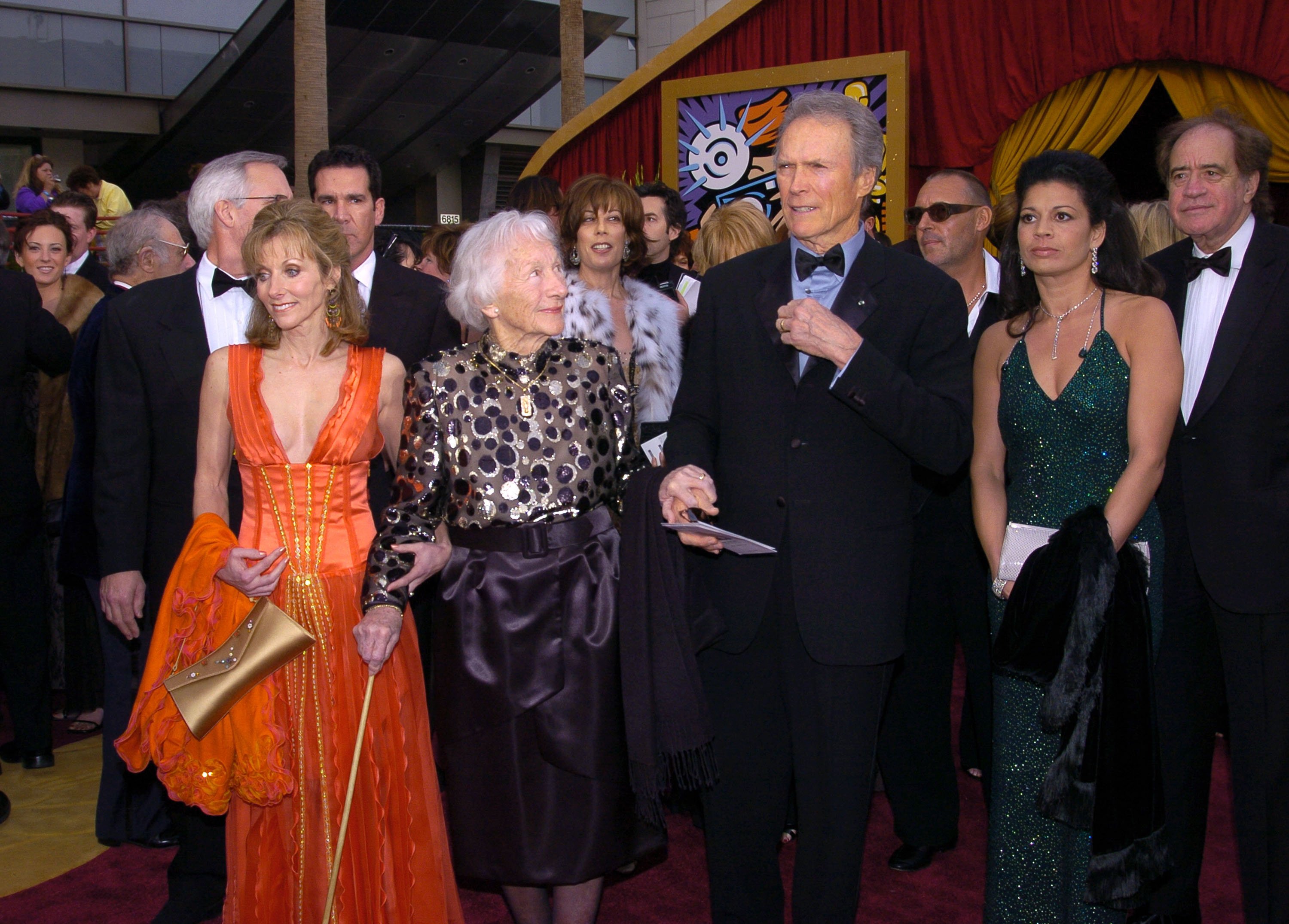 Clint Eastwood with his daughter Laurie Murray, his mother Ruth Wood, and wife Dina Eastwood at the 76th Annual Academy Awards on February 29, 2004, in California. | Source: Getty Images