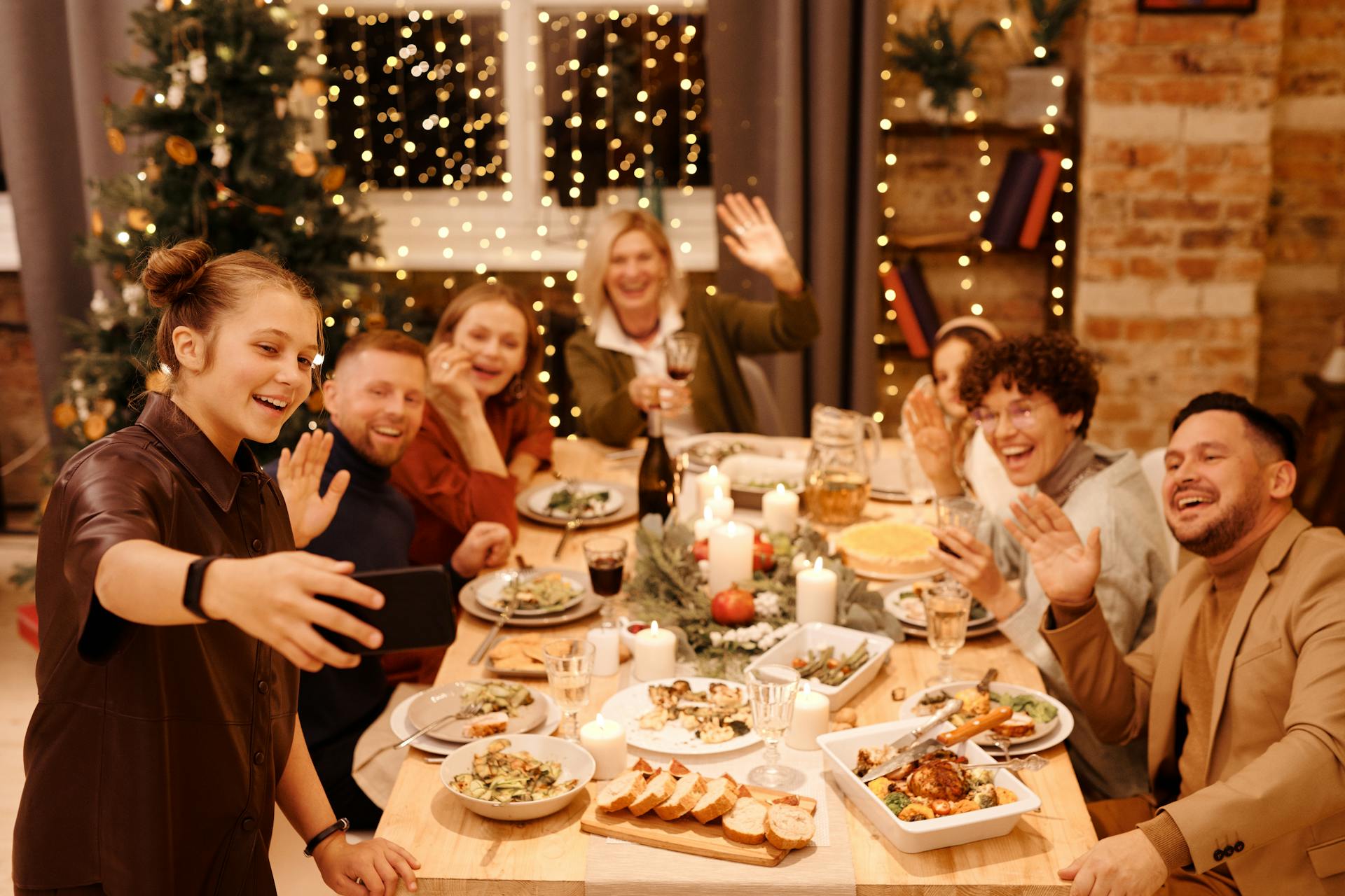 A cheerful family at a festive dinner | Source: Pexels