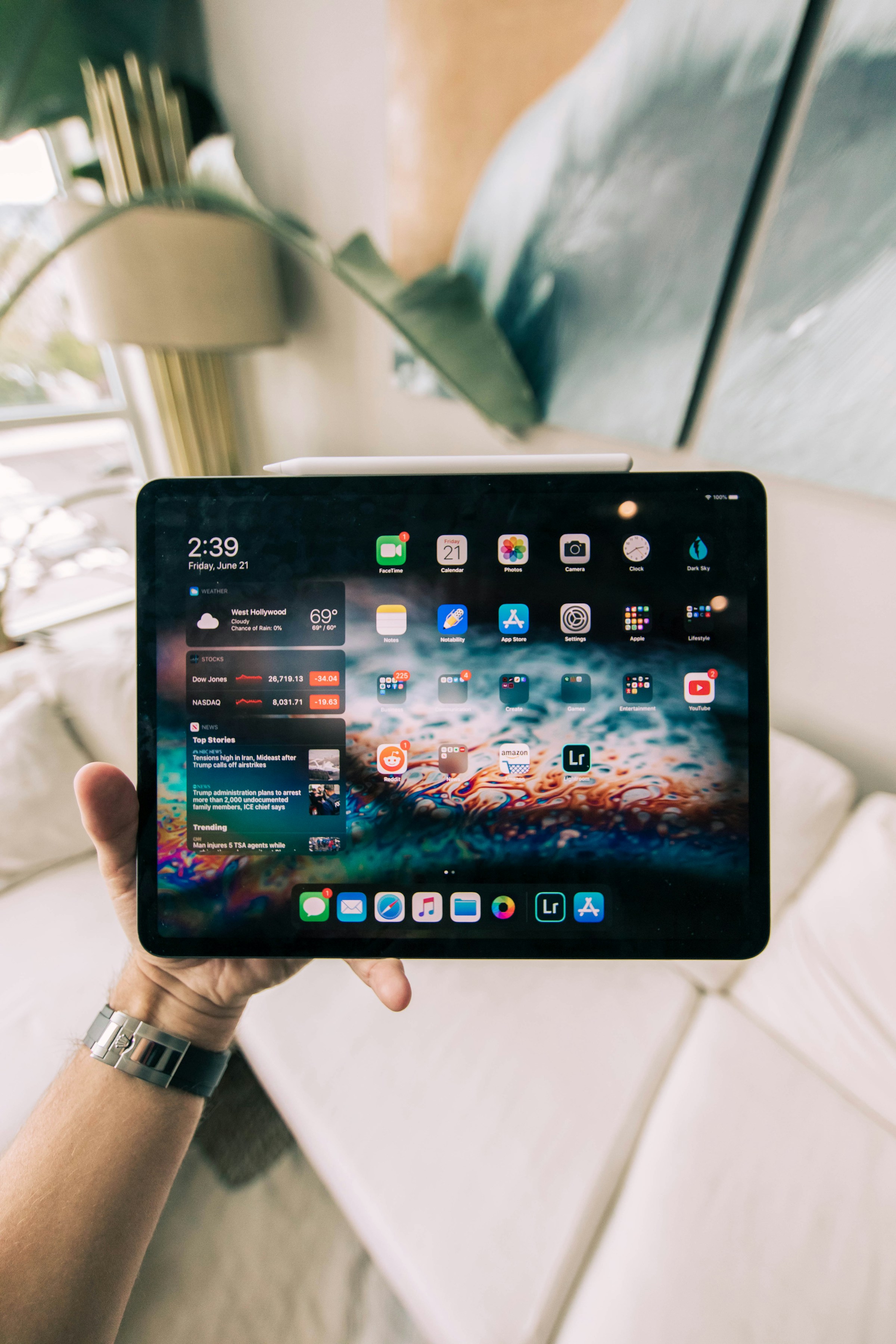 A person holding an iPad | Source: Unsplash