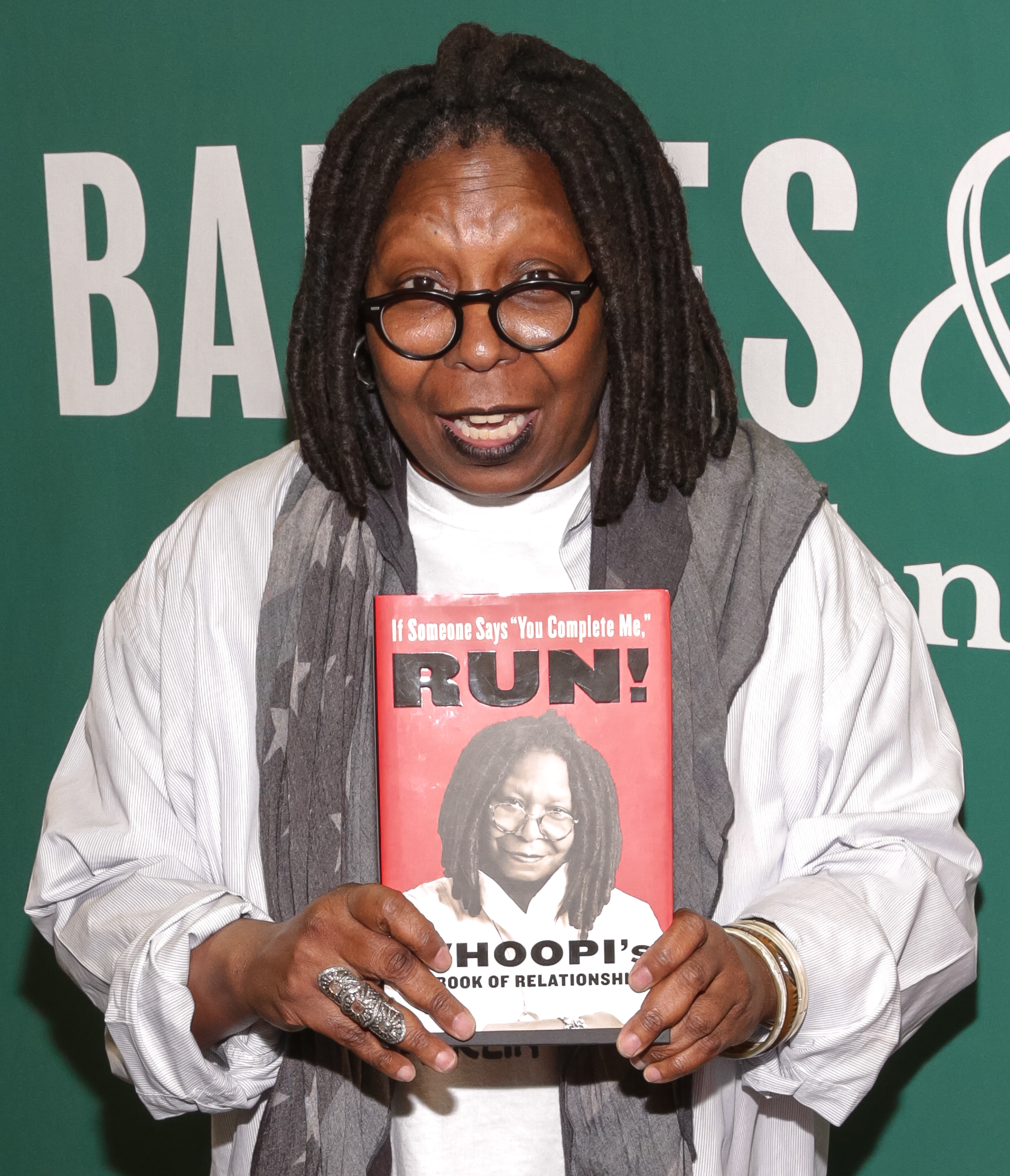 Whoopi Goldberg at the "If Someone Says You Complete Me, RUN!: Whoopi's Big Book of Relationships" signing in New York City, 2015 | Source: Getty Images