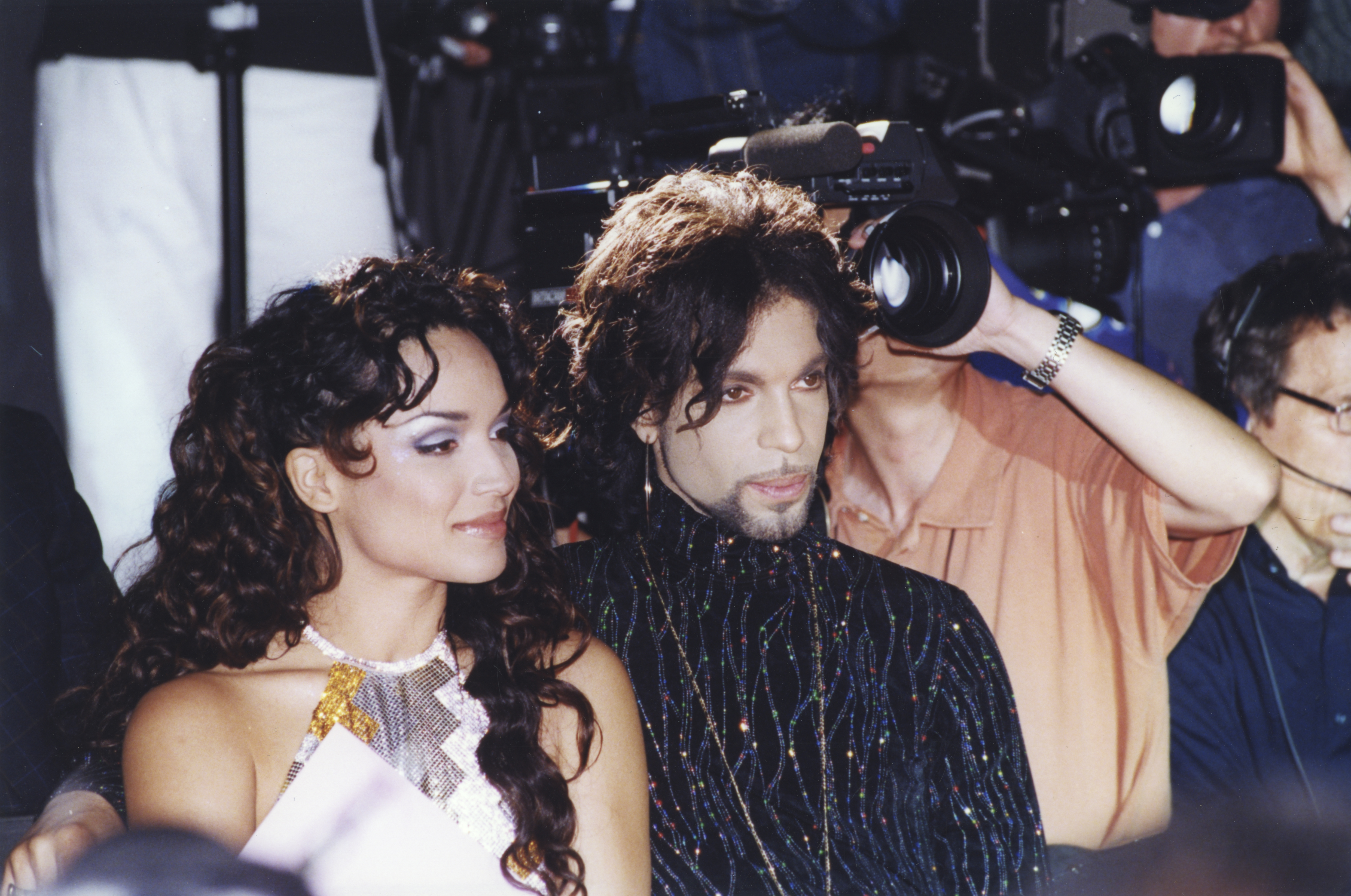 Prince Rogers Nelson and Mayte Garcia at the Versace fashion show on July 15, 1999 in Paris, France | Source: Getty Images