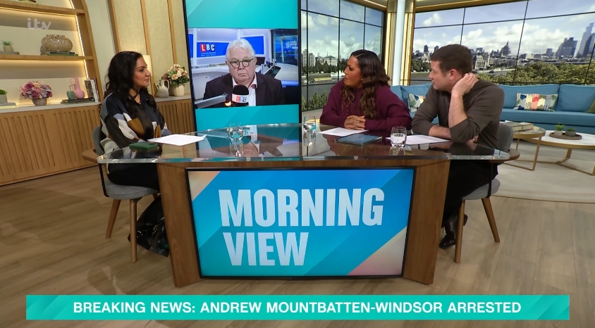 The panel on "This Morning" is seen reacting in real time as the breaking news banner announcing Andrew Mountbatten-Windsor's arrest flashes across the bottom of the screen. The image, taken from a video dated February 19, 2026, captures the moment the discussion shifted from routine programming to a developing national story. | Source: YouTube/This Morning