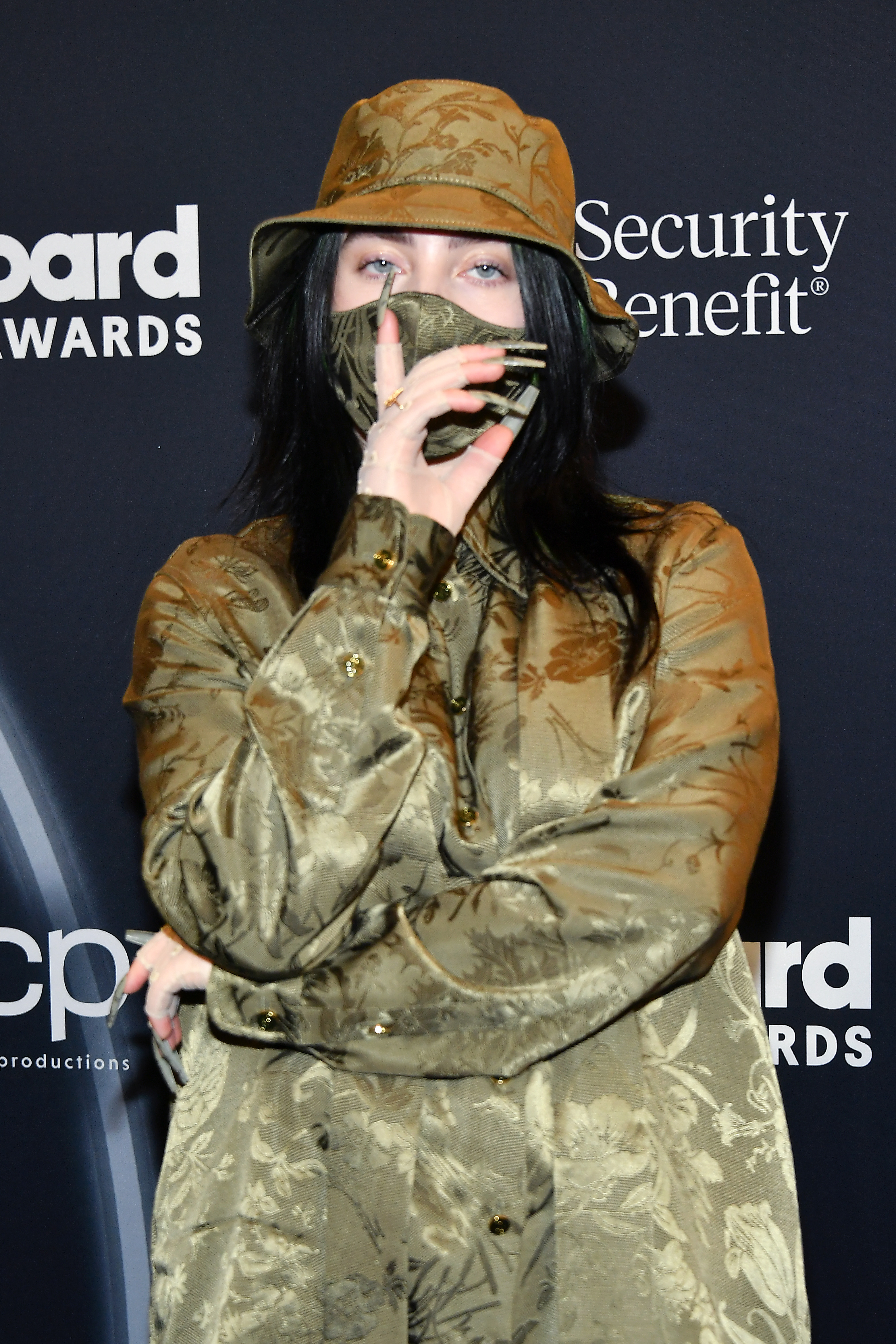 Billie Eilish poses backstage at the Billboard Music Awards, broadcast in Los Angeles, California, on October 14, 2020. | Source: Getty Images