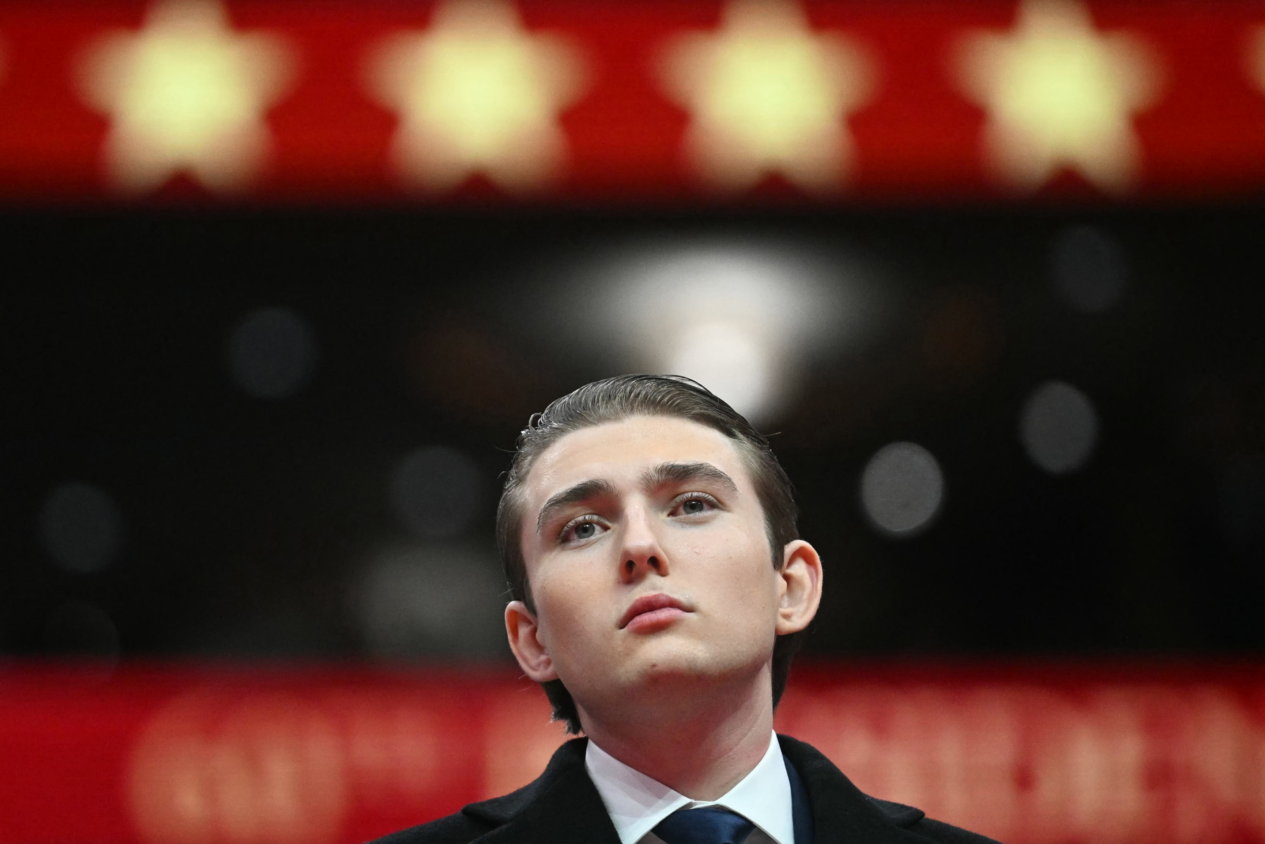 Barron Trump looks on during the inaugural parade inside Capital One Arena | Source: Getty Images