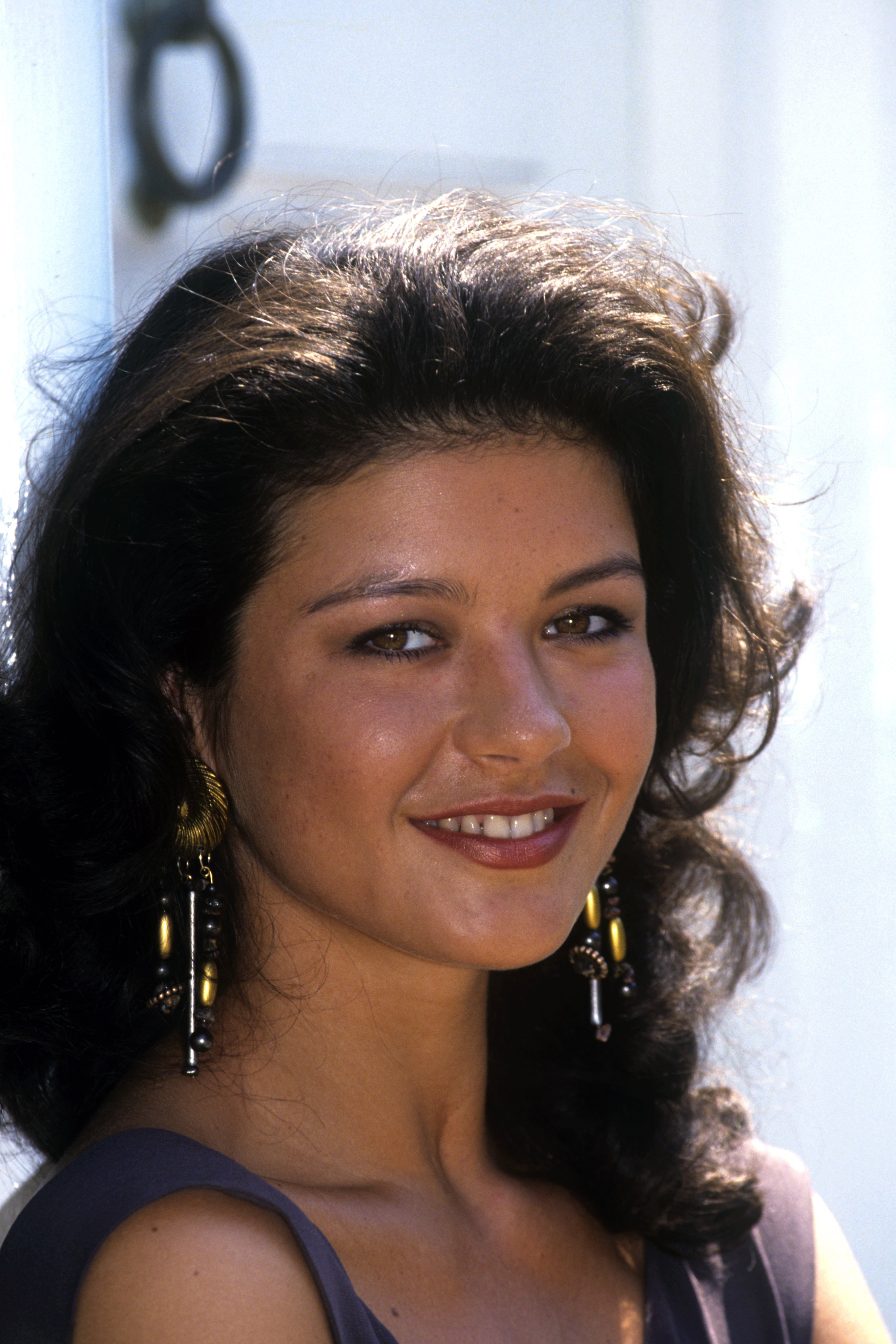 Catherine Zeta Jones at the launch of the BBC comedy drama "Out of the Blue" in which she starred, in London, England on 29th July, 1991 | Source: Getty Images 
