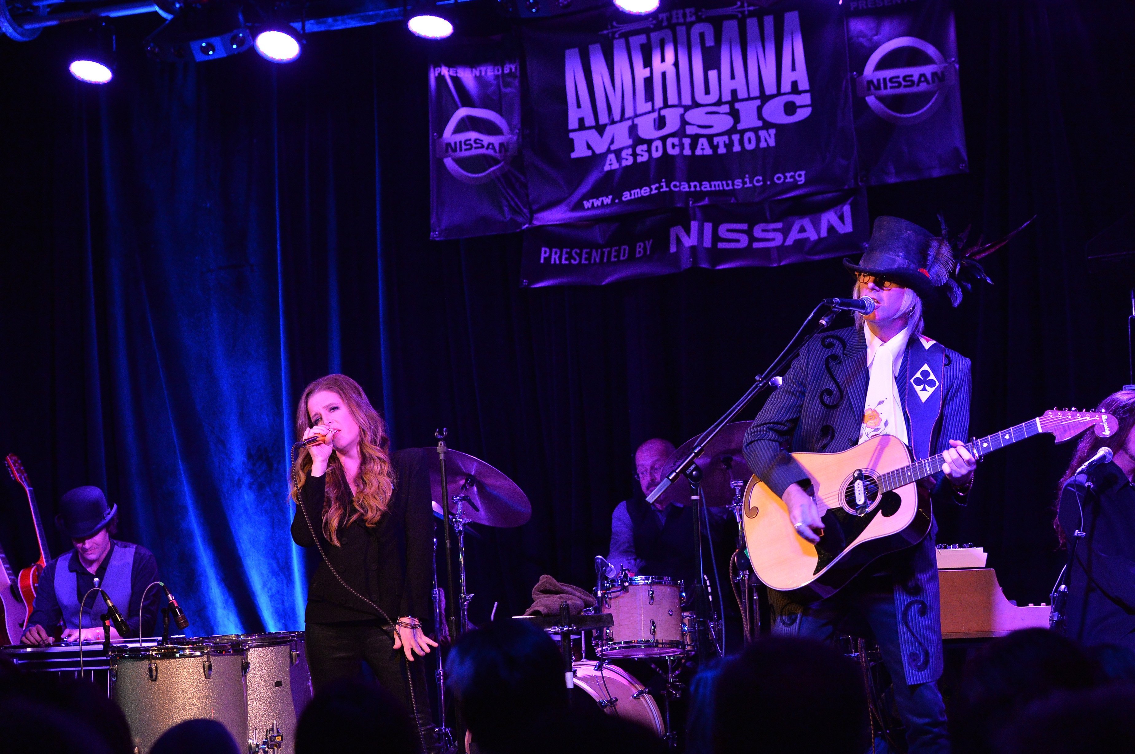 Lisa Marie Presley and Husband Michael Lockwood perform at 3rd & Lindsley during the 14th Annual Americana Music Festival & Conference - Festival - Day 3 on September 20, 2013, in Nashville, United States. | Source: Getty Images.
