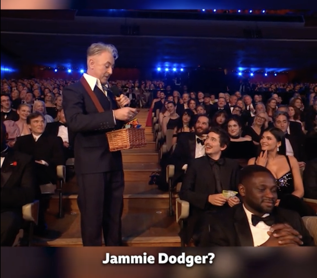 Alan Cumming offering a snack to Kylie Jenner at the 79th BAFTA Film Awards dated February 22, 2026 | Source: TikTok/bbc