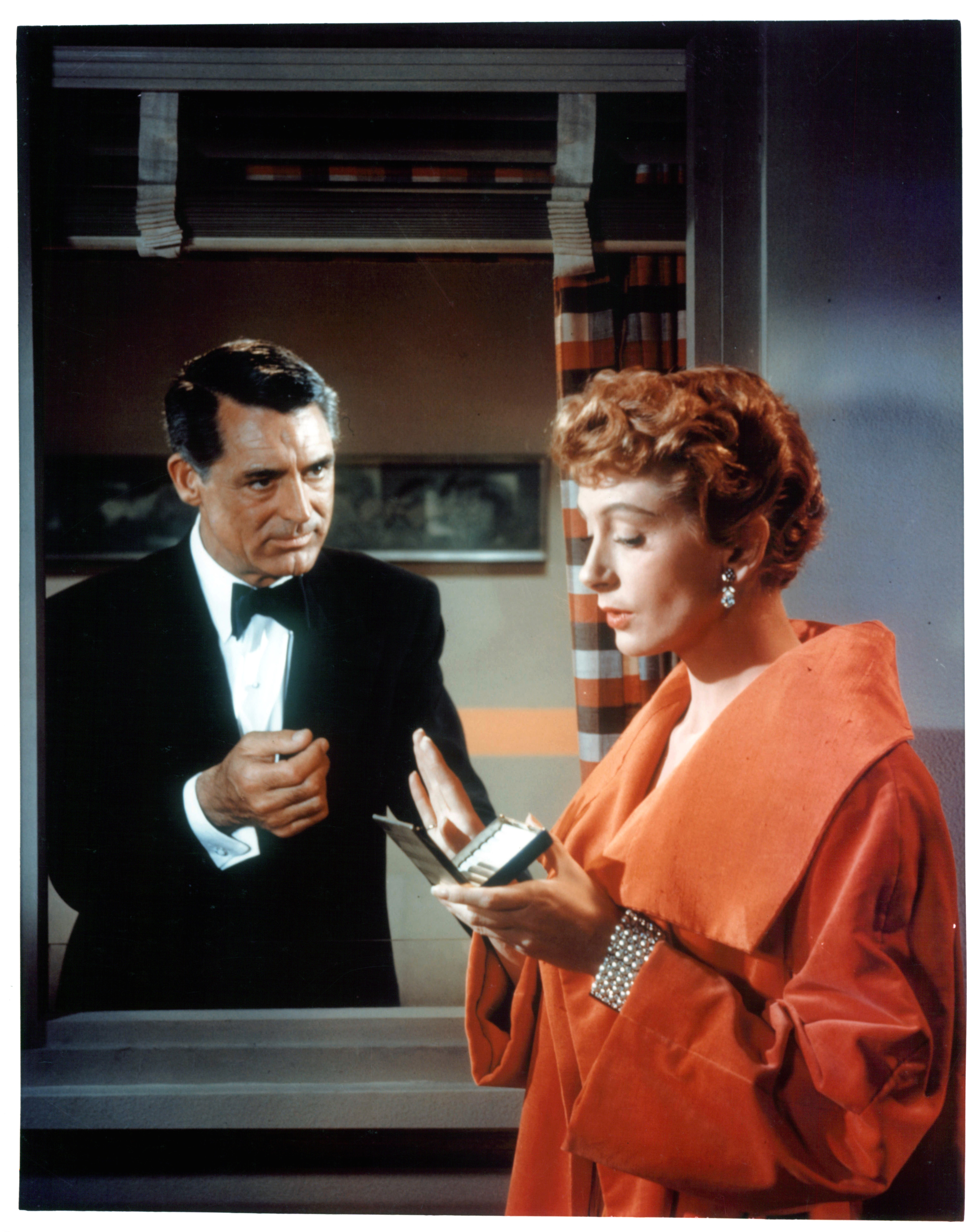 Cary Grant asks Deborah Kerr for a cigarette in a scene from the film "An Affair To Remember," 1957. | Source: Getty Images