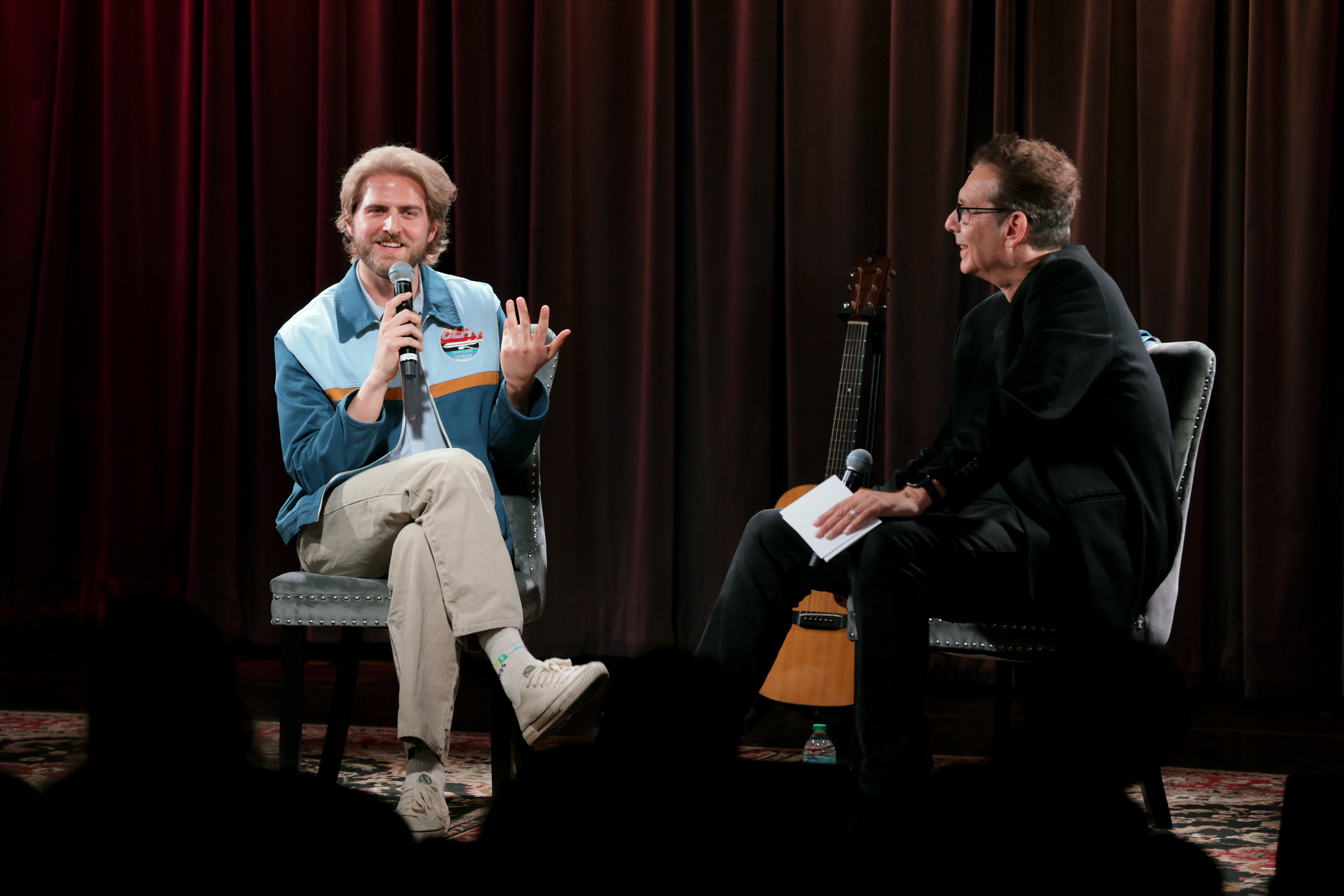 Christian Lee Hutson speaks with Adam Weissler at Spotlight: Christian Lee Hutson at GRAMMY Museum L.A. Live in California on December 9, 2024. | Source: Getty Images