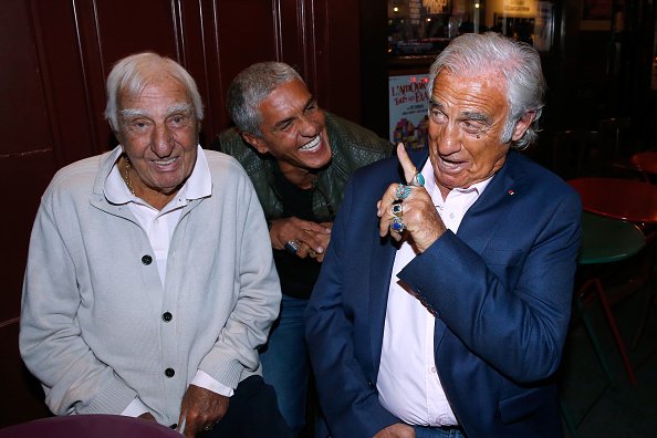 Charles Gérard et Jean-Paul Belmondo au 10e Festival du film Lumière le 13 octobre 2018 à Lyon, France. | Photo : Getty Images