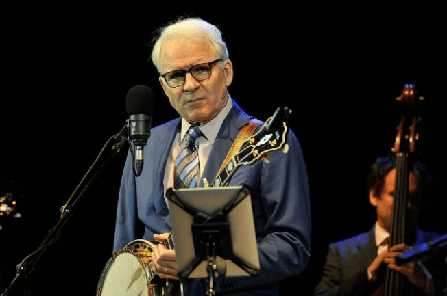 Steve Martin performs with the Steep Canyon Band at Hammersmith Apollo. | Photo: Getty Images