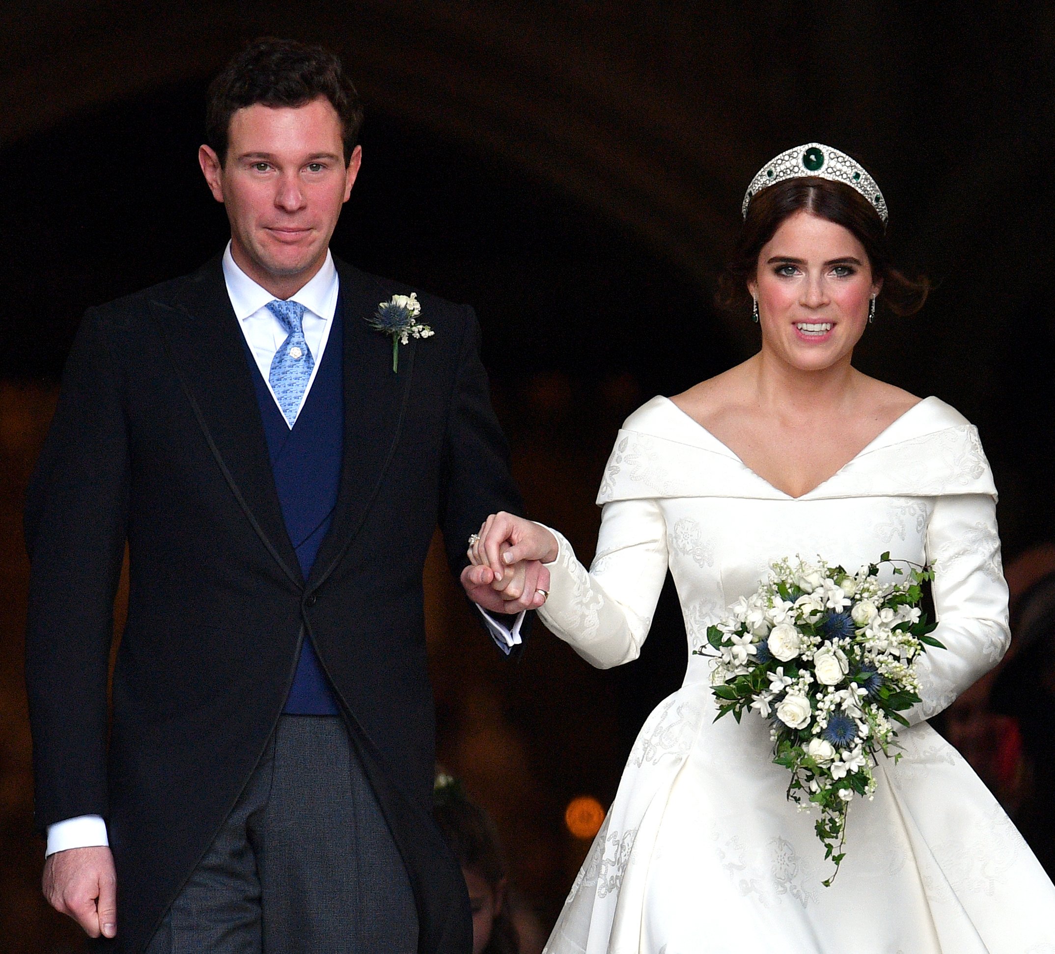 Jack Brooksbank and Princess Eugenie leave St George's Chapel after their wedding ceremony on October 12, 2018, in Windsor, England. | Source: Getty Images.