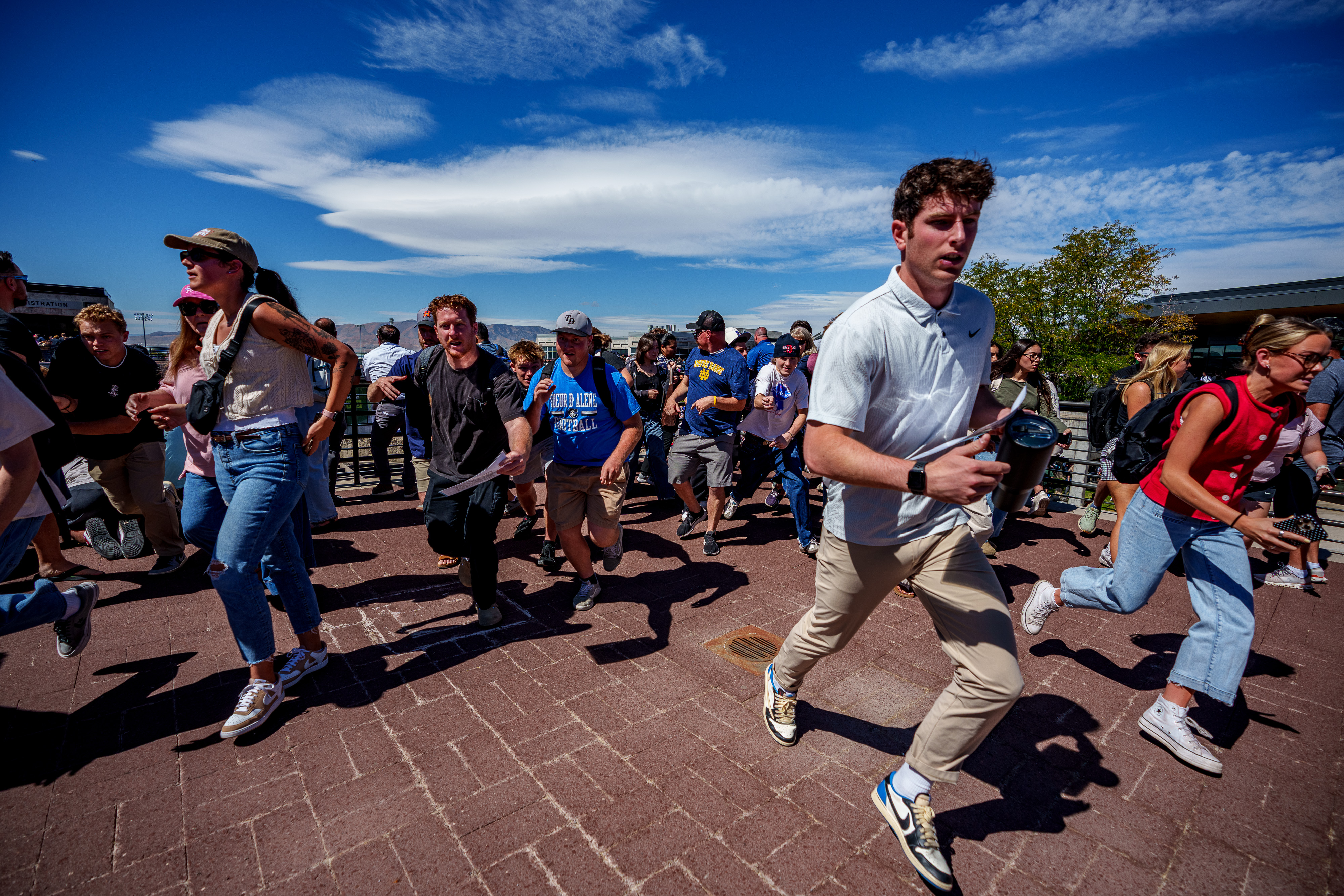 Chaos and confusion erupt after shots were fired during an appearance by Charlie Kirk at Utah Valley University on September 10, 2025 | Source: Getty Images