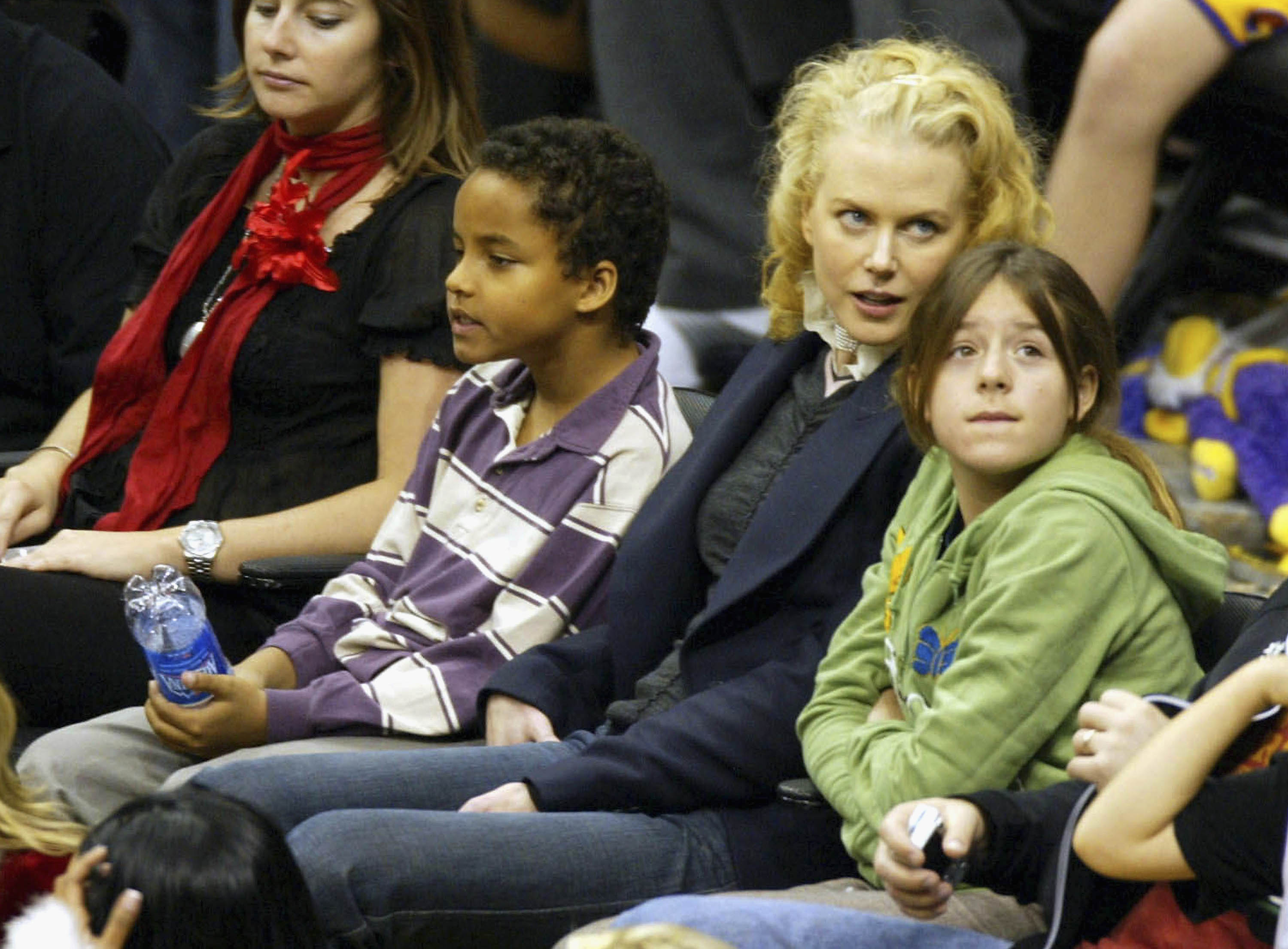Nicole Kidman, Connor Cruise, and Isabella Cruise attend a game between the Los Angeles Lakers and the Miami Heat at the Staples Center on December 25, 2004, in Los Angeles, California | Source: Getty Images