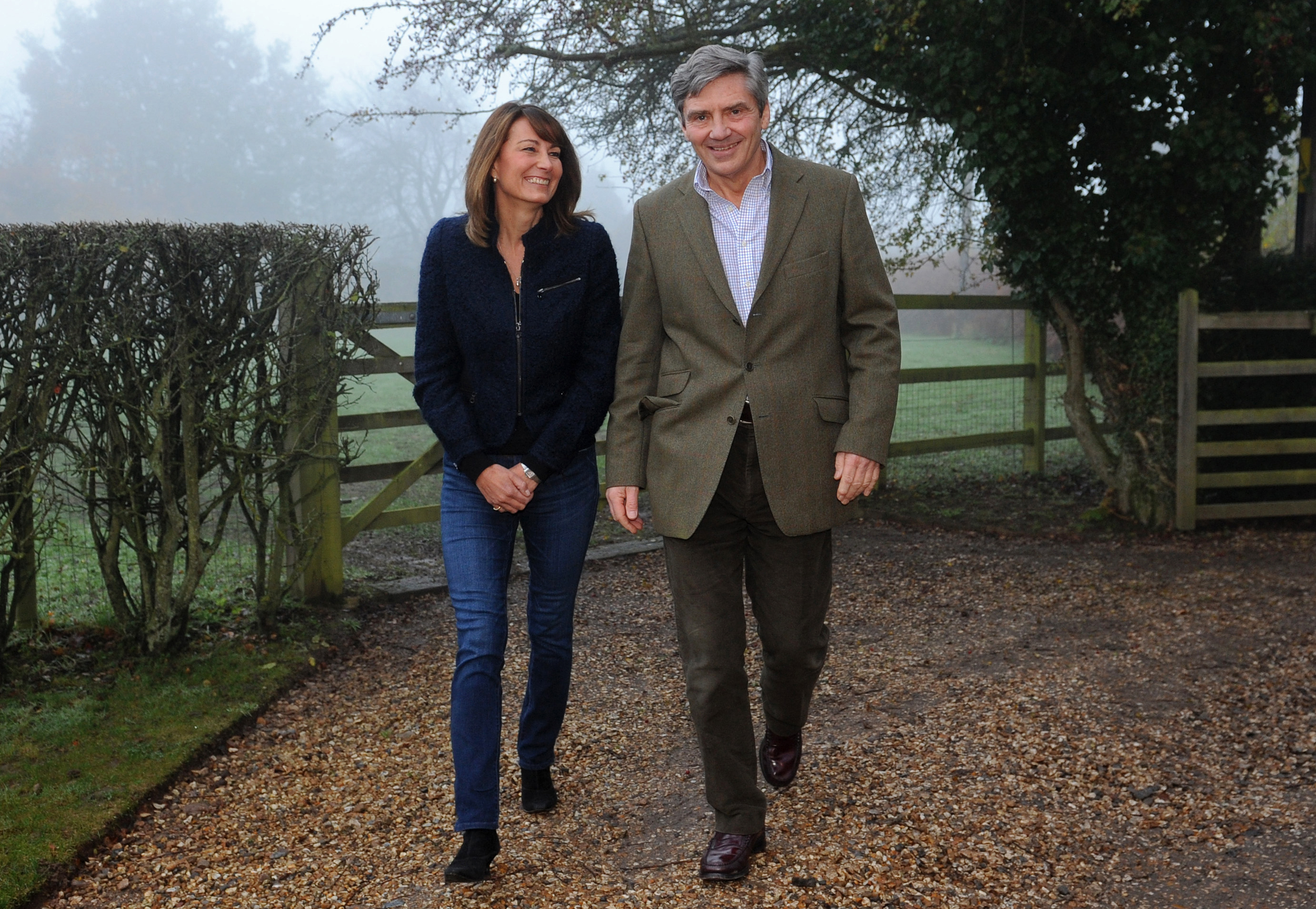 Michael and Carole Middleton pose for a photograph at their home in Berkshire, southern England on November 16, 2010. | Source: Getty Images